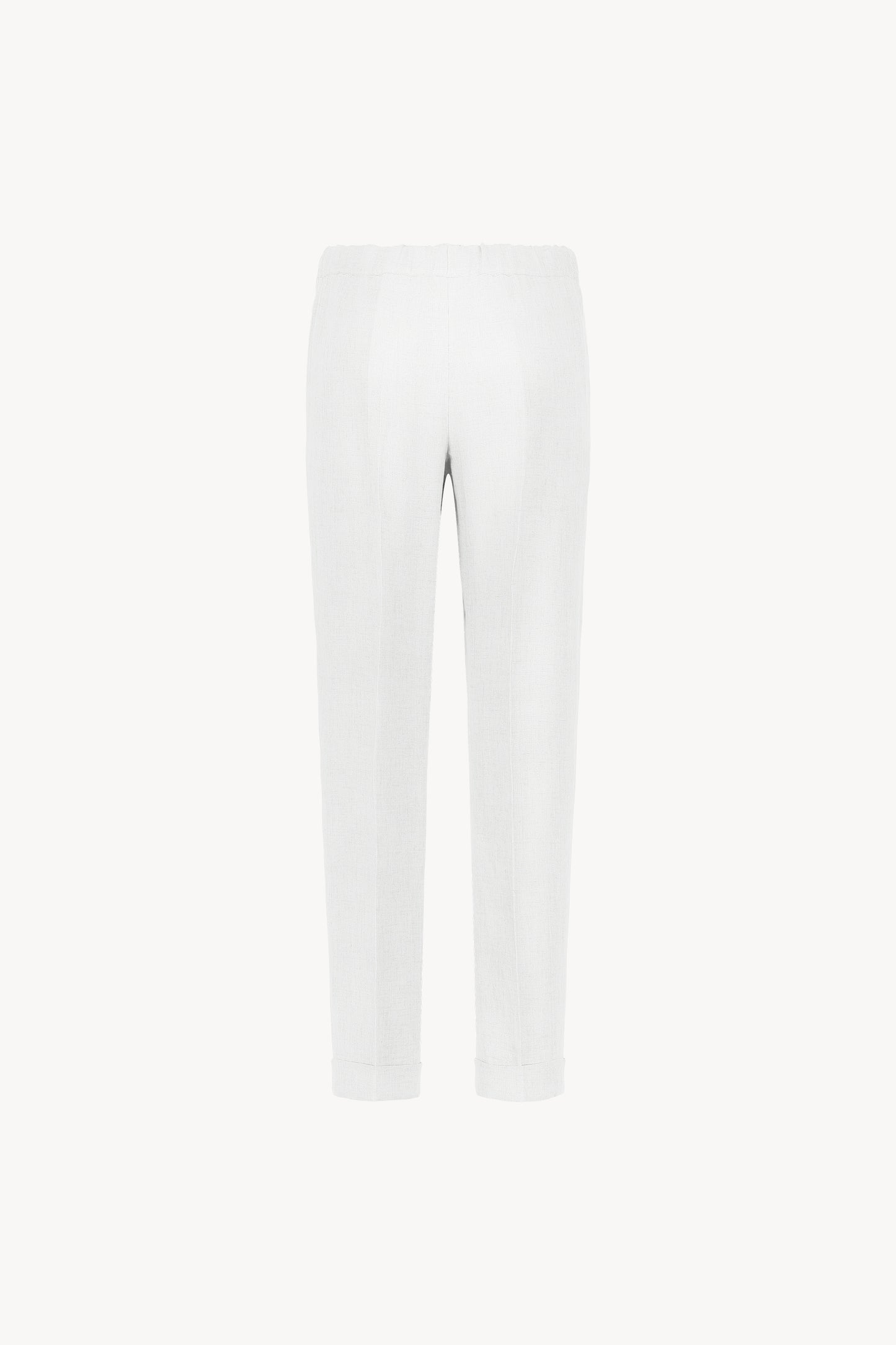 Pantalon à plis en lin blanc décontracté avec une taille froncée.