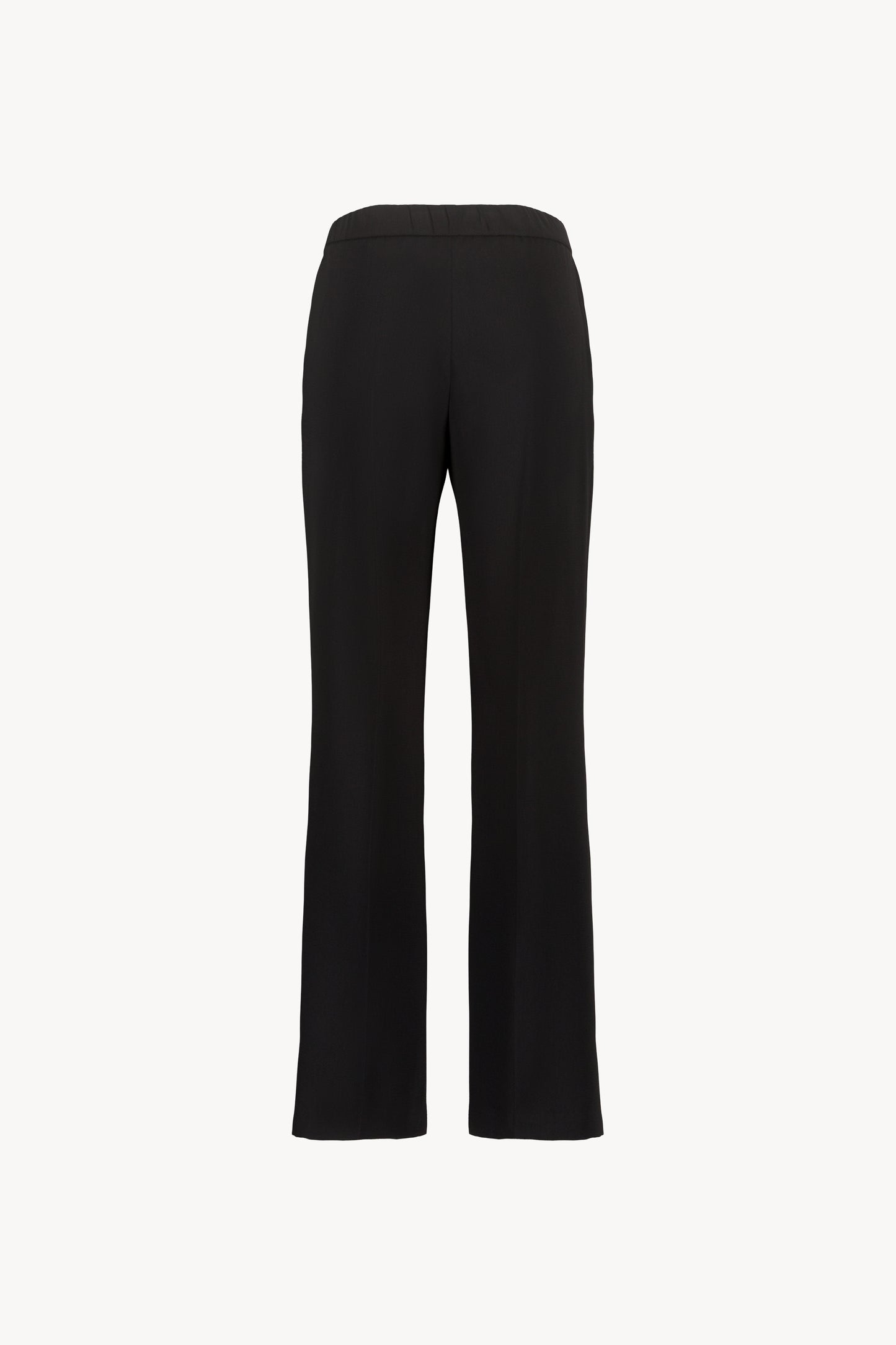 Ce pantalon noir offre un tombé parfait, une coupe droite moderne et une ceinture intérieure élastique.