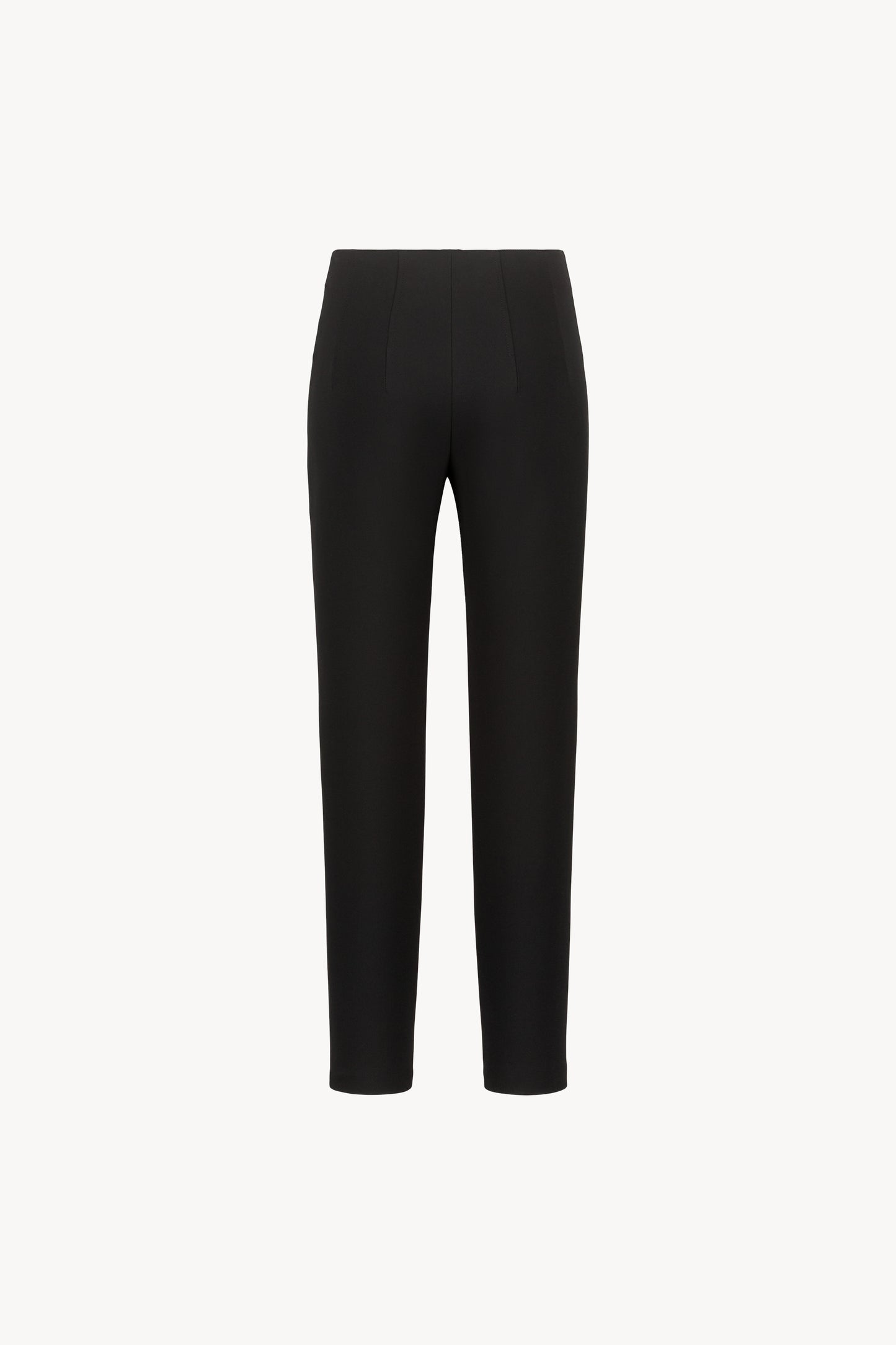 Ce legging noir à la coupe ajustée sublime la silhouette grâce à sa taille haute et sa pince structurante.