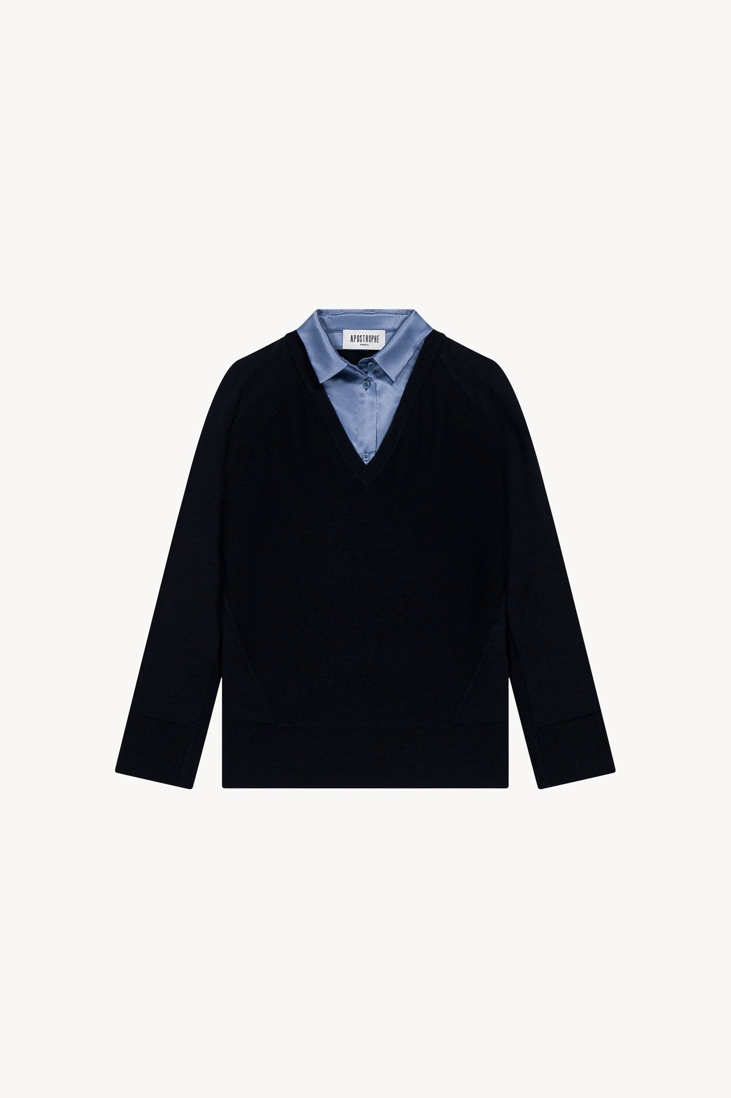 Pull bi-matière en laine marine avec col chemise ouvert et détails satinés aux poignets et au bas.