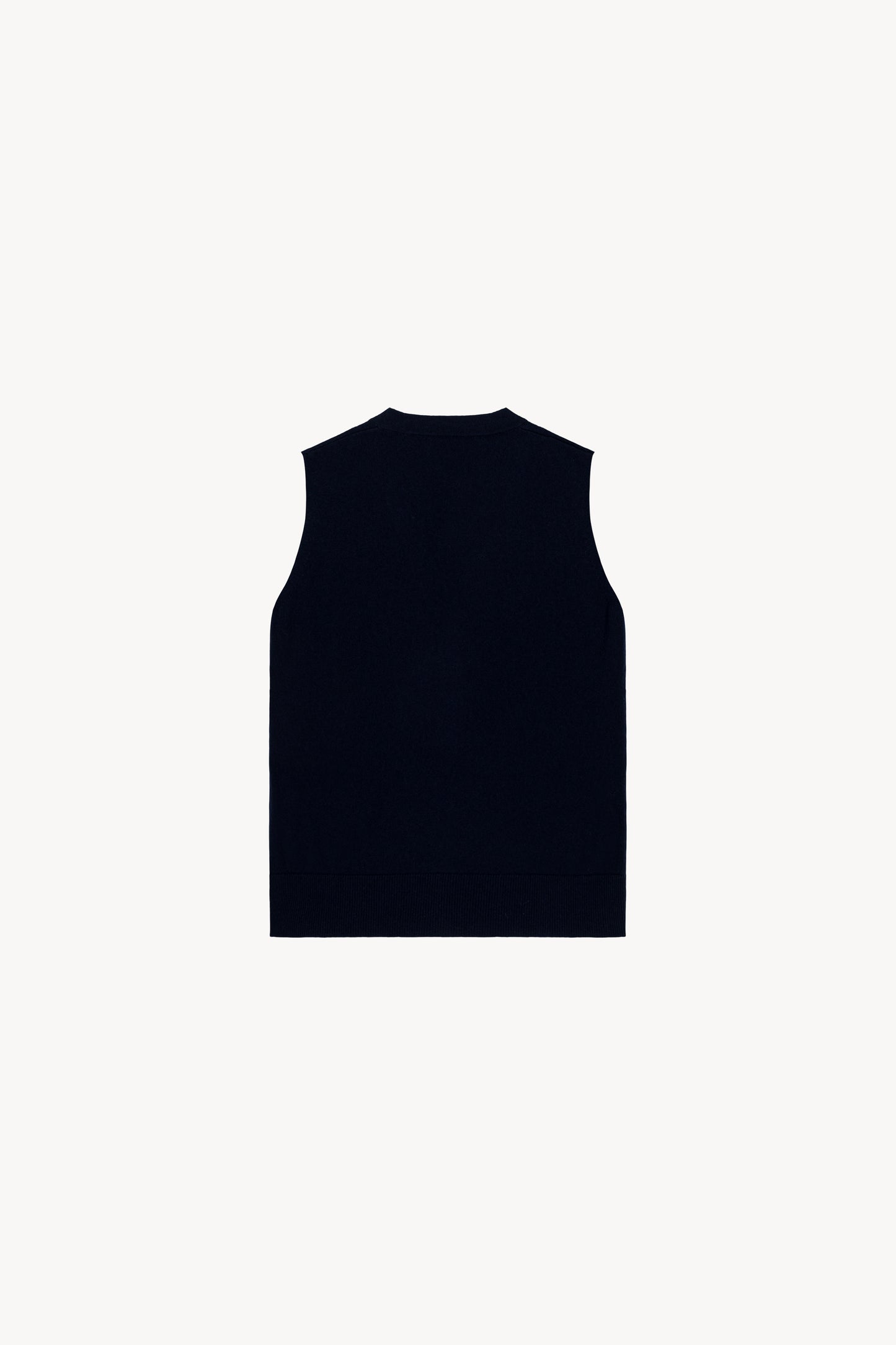 Gilet bleu marine sans manches , avec col V et finitions embossées et tubulaires