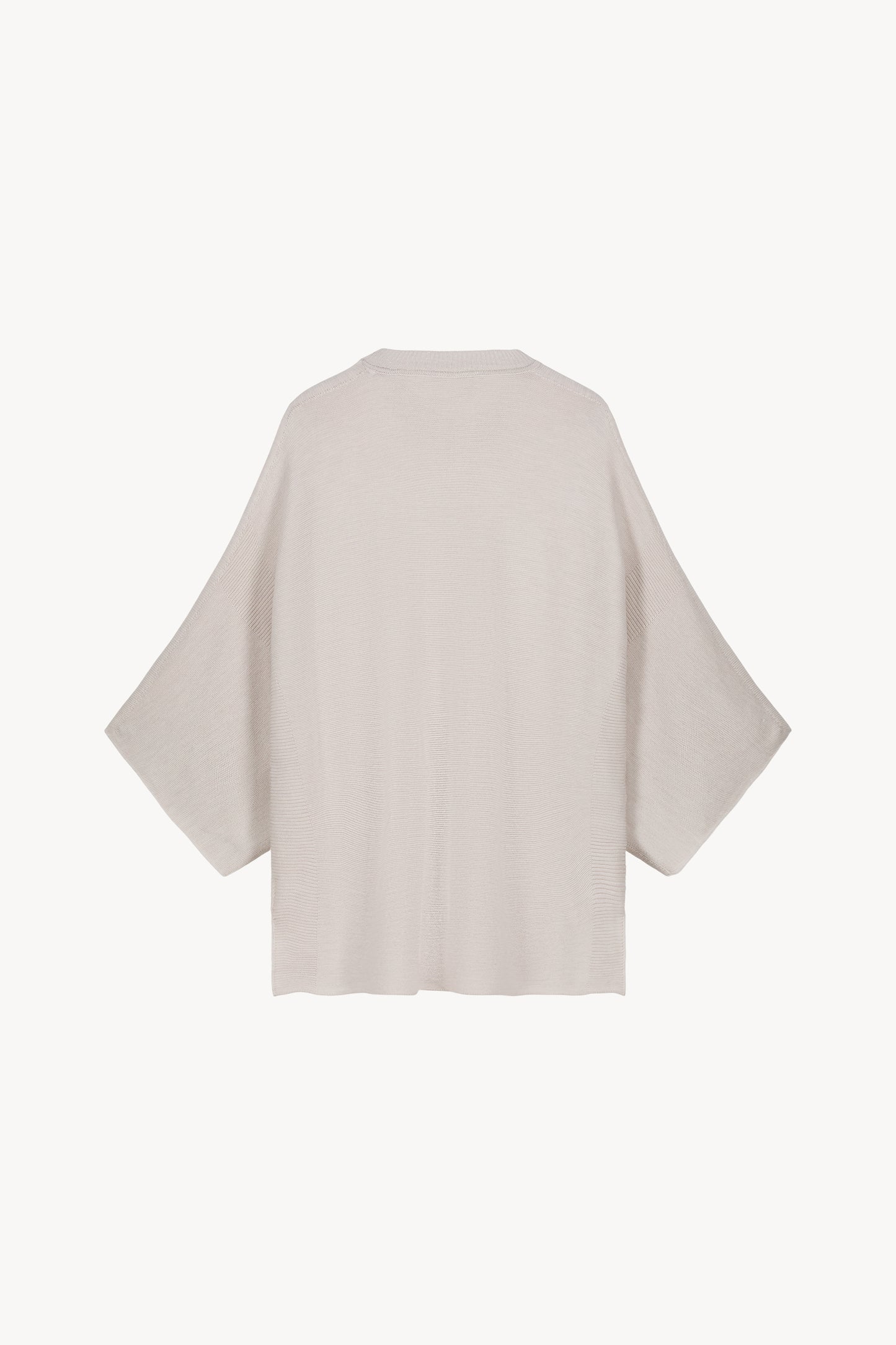 Poncho transparent en maille de laine