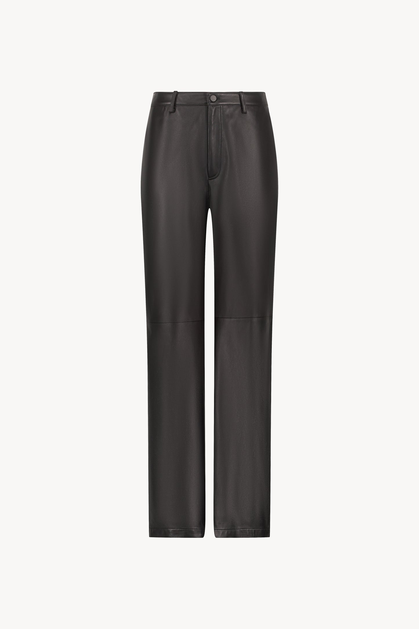 Pantalon noir en cuir, large avec coupe inspirée du jean et découpe au niveau des genoux.