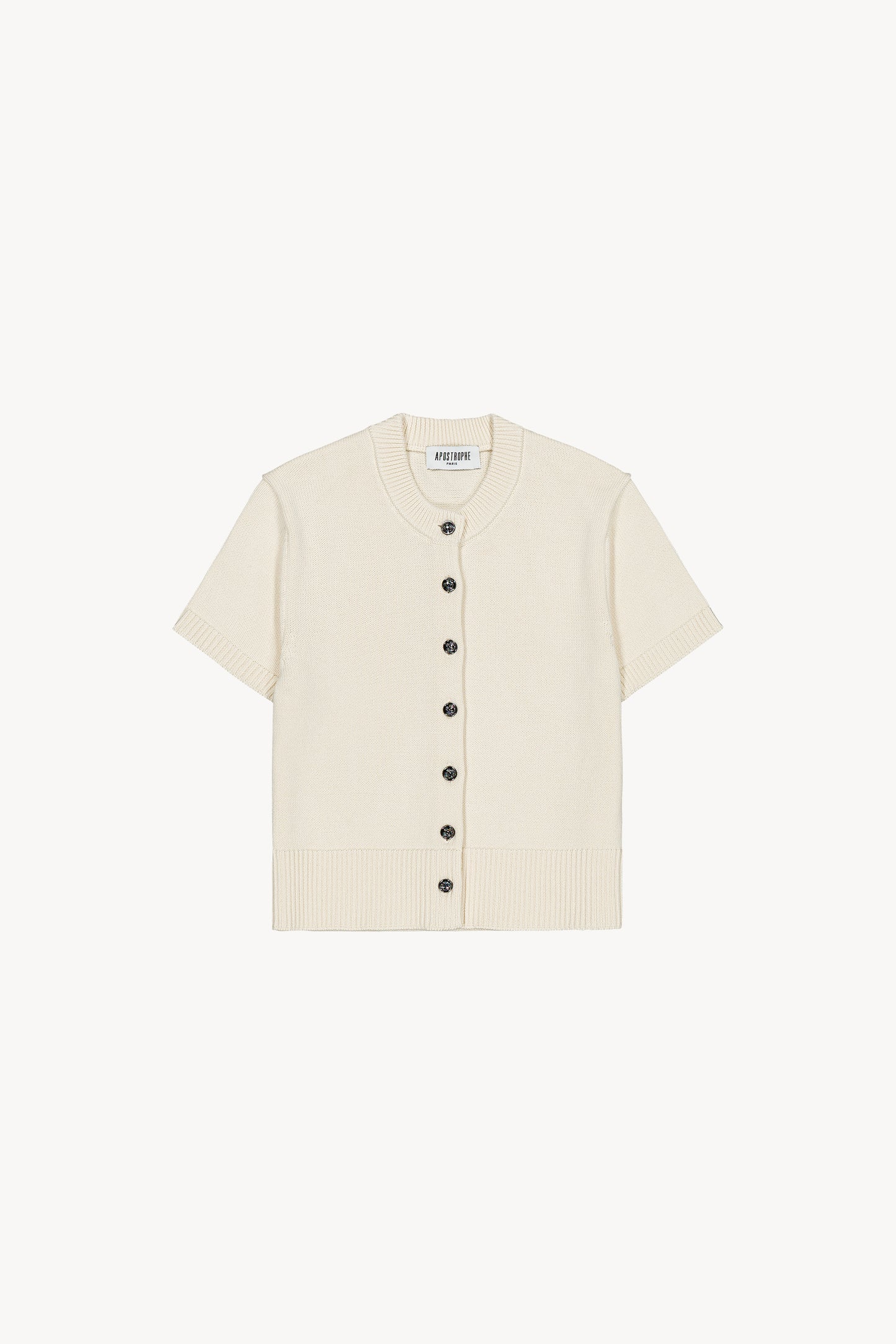 Gilet blanc cassé avec encolure arrondie, manches courtes et boutons métalliques