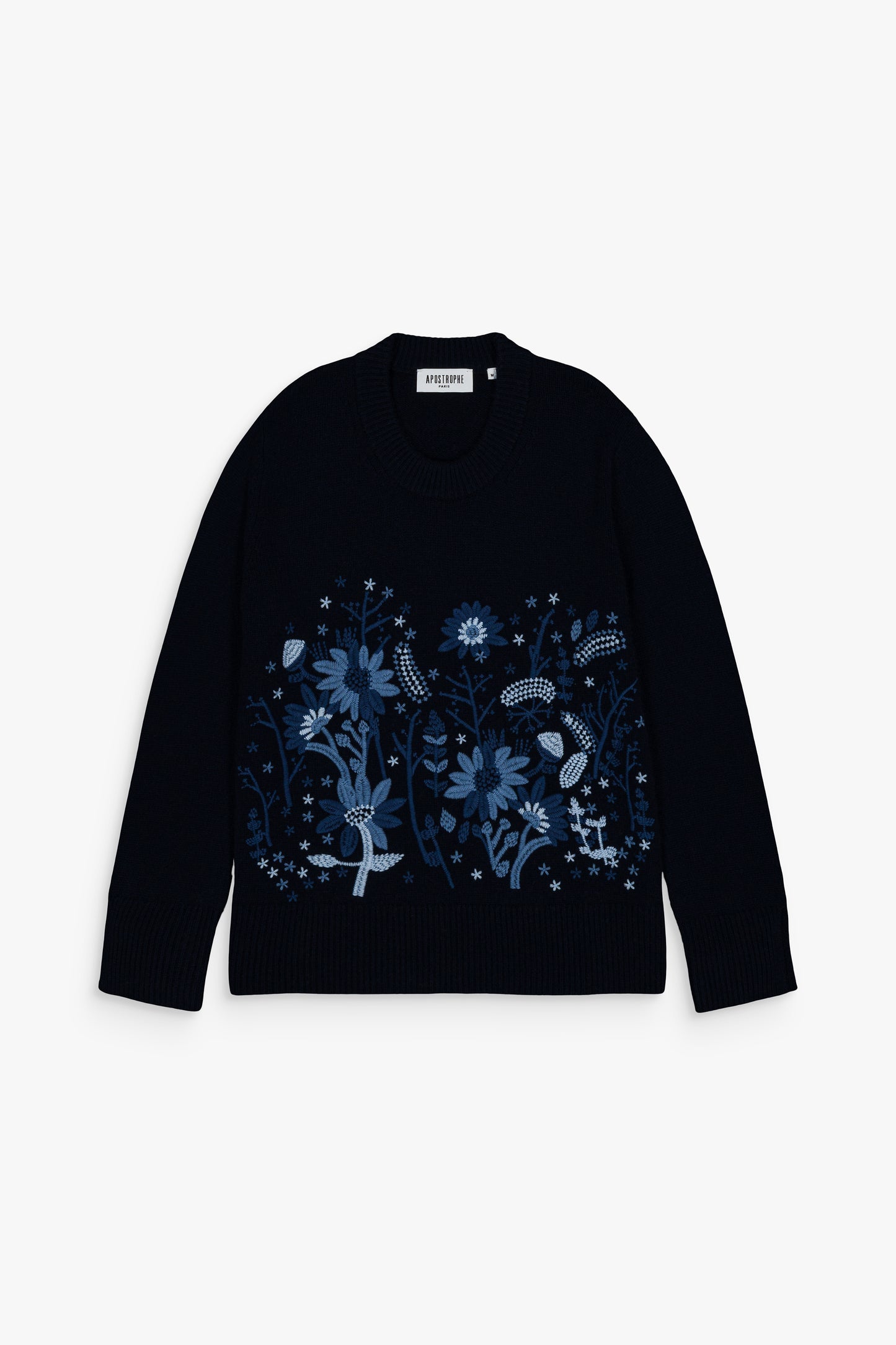 Pull droit en laine et cachemire, couleur marine, finitions côtelées et broderies délicates.