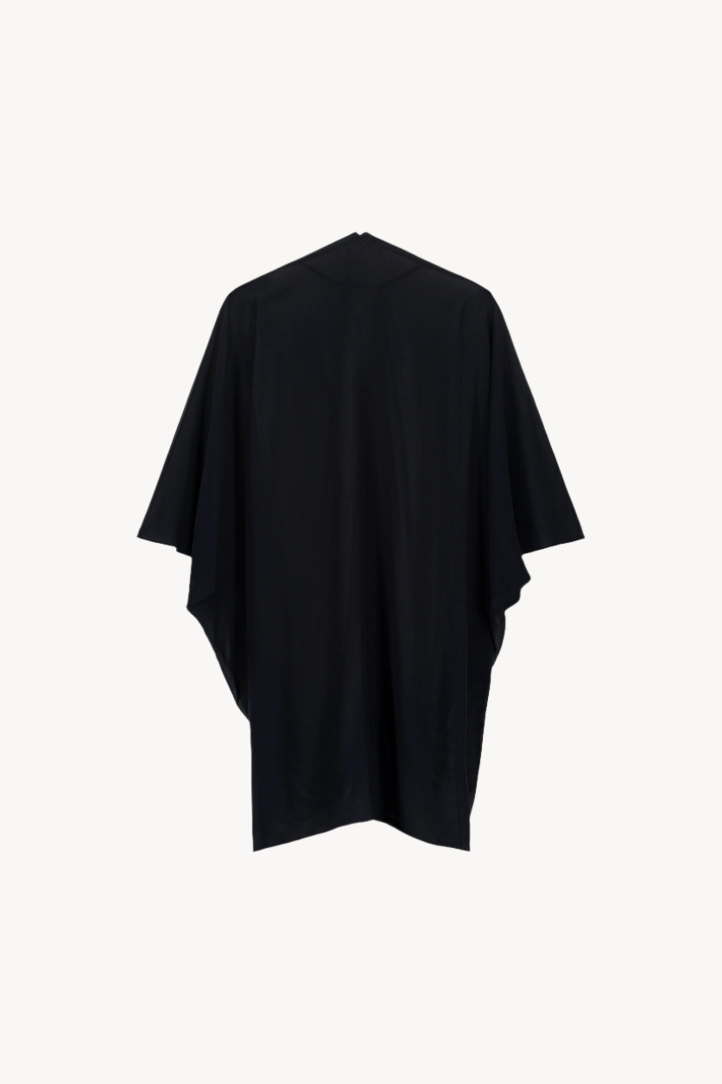 Gilet chauve-souris en mousseline de soie marine, orné d'une coupe élégante et aérienne. Transparent avec manches chauves-souris, effet froncé et bords surpiqués pour une allure chic.