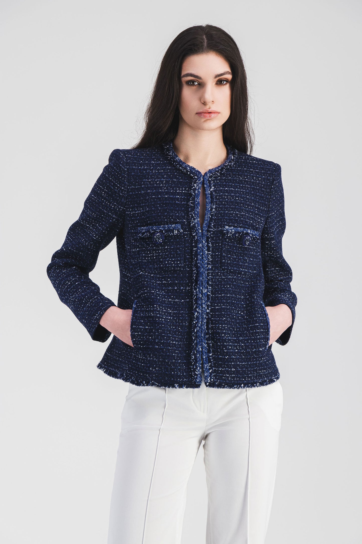 Short navy tweed jacket with fringe details