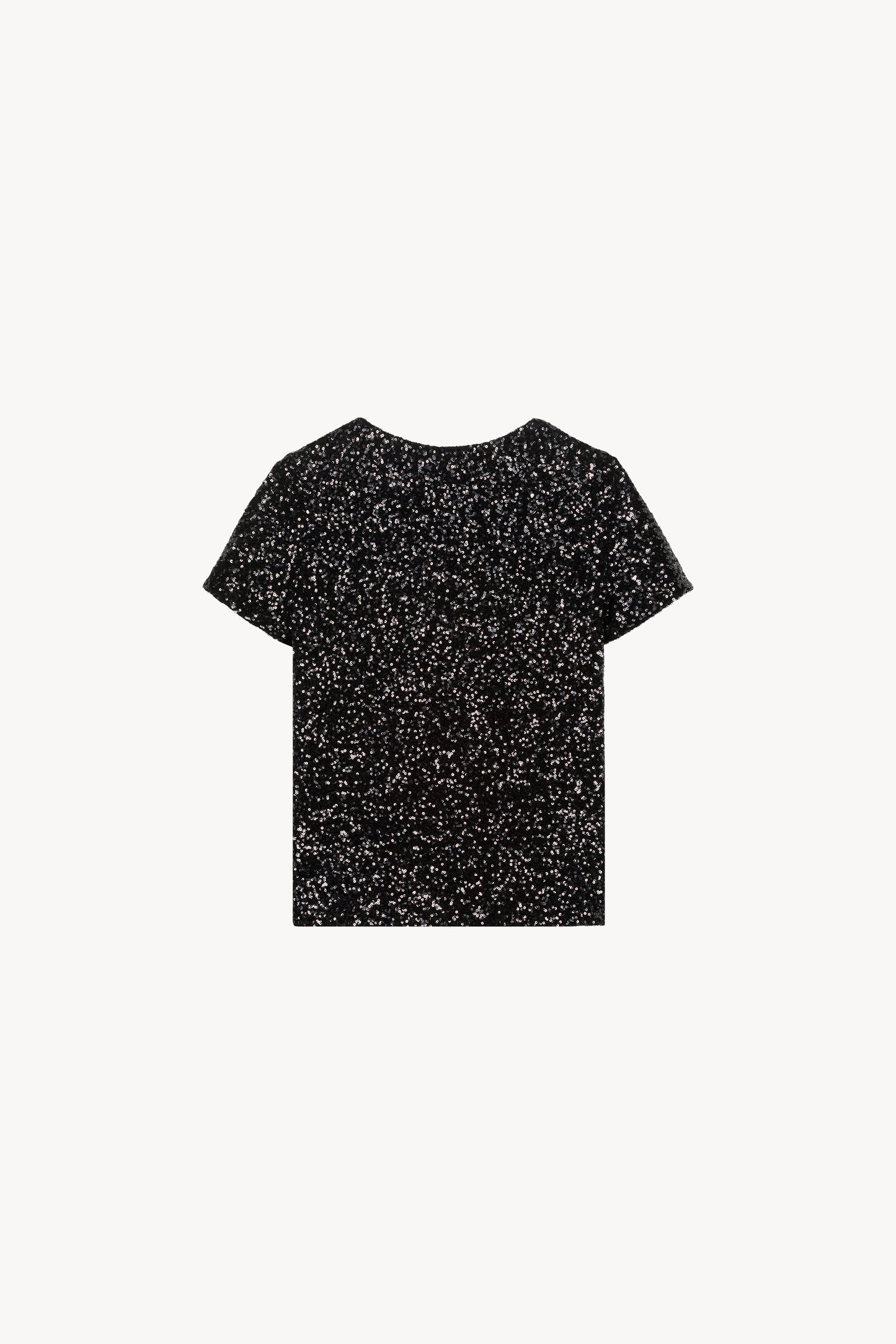Col rond et manches courtes. Orné de sequins noirs