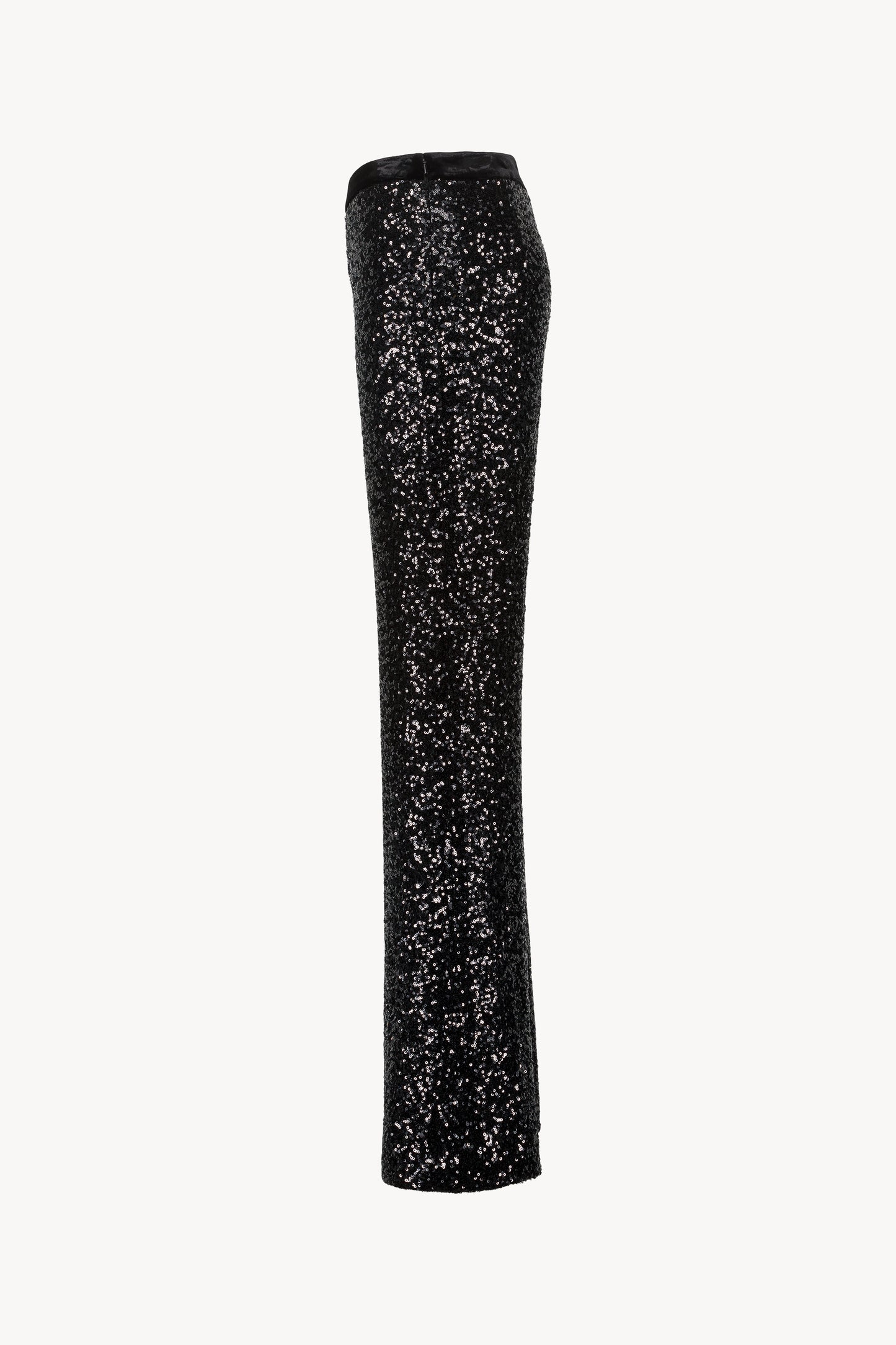 Pantalon droit avec taille en velours élastique, zip caché et fentes latérales.