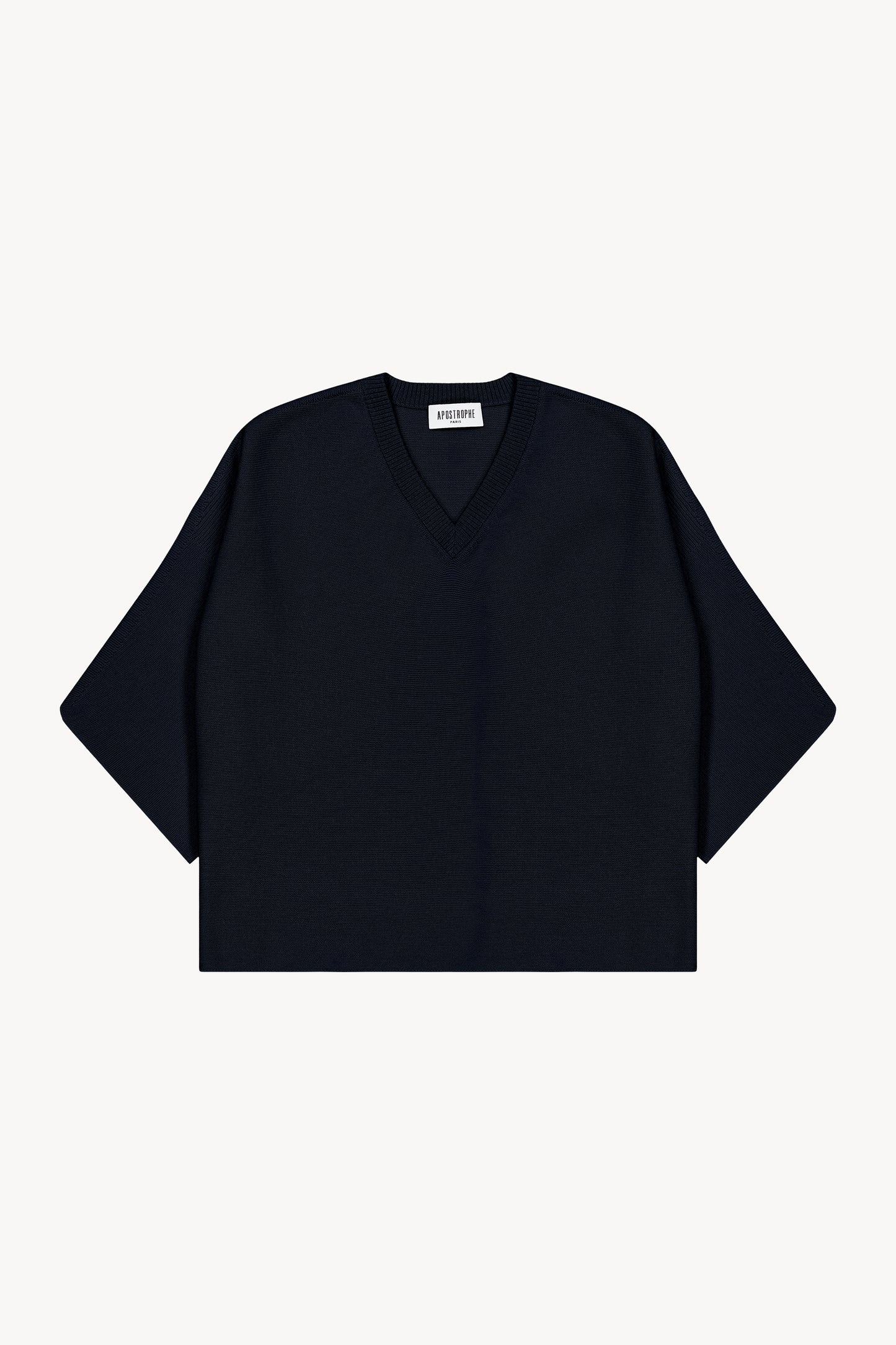 Élégant et confortable, ce pull en laine à col V se distingue par ses finitions côtelées et ses touches de lurex.