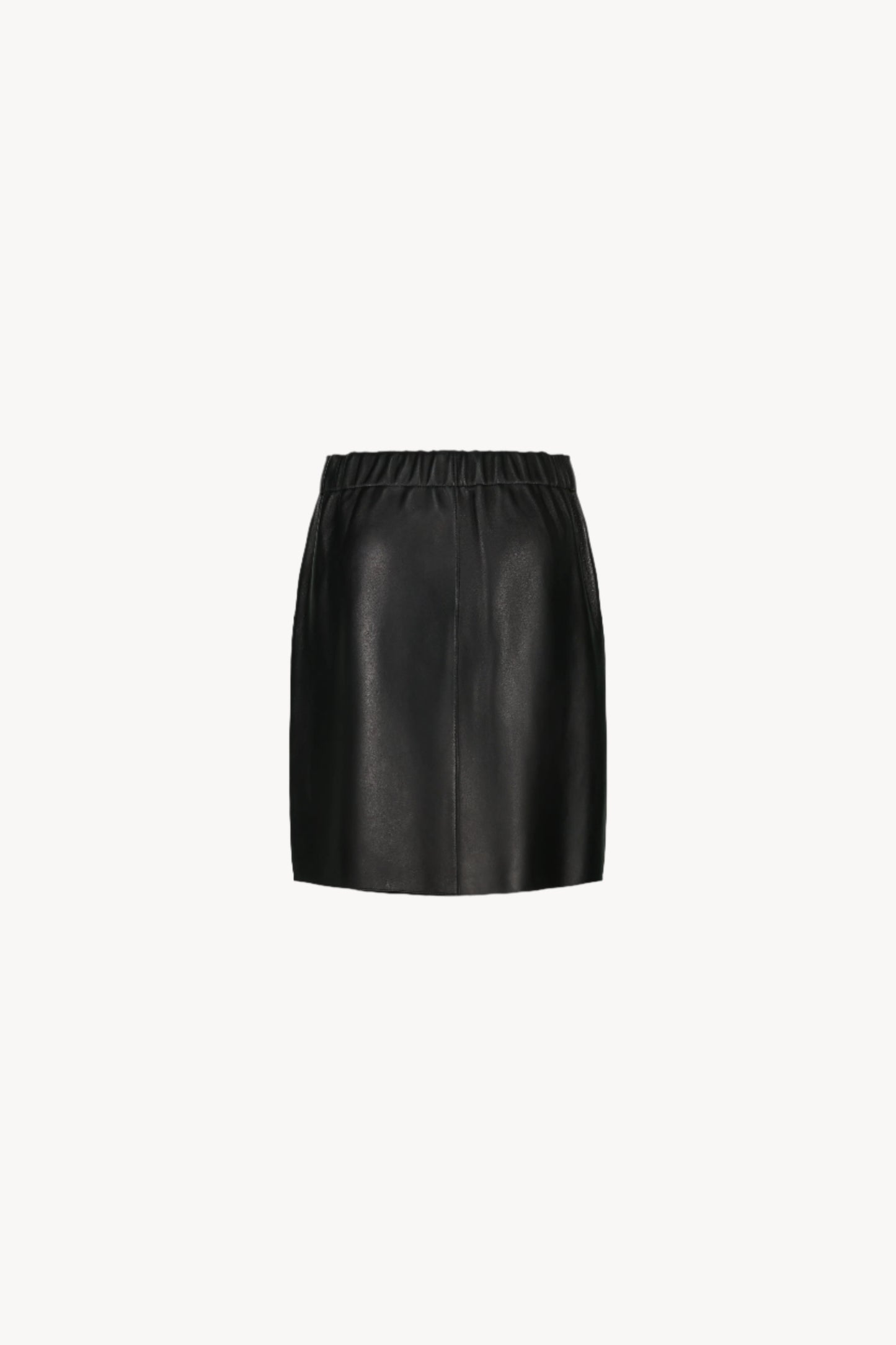 Jupe en cuir asymétrique Apostrophe avec double piping et ceinture froncée, offrant un design moderne et élégant.