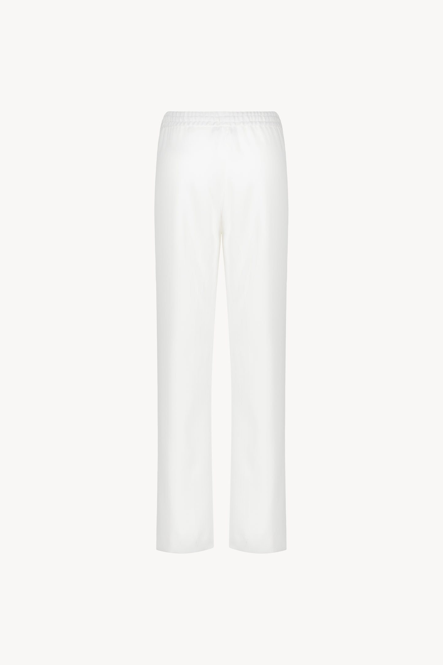 Pantalon fluide large blanc cassé avec cordons réglables avec embouts métal gravés