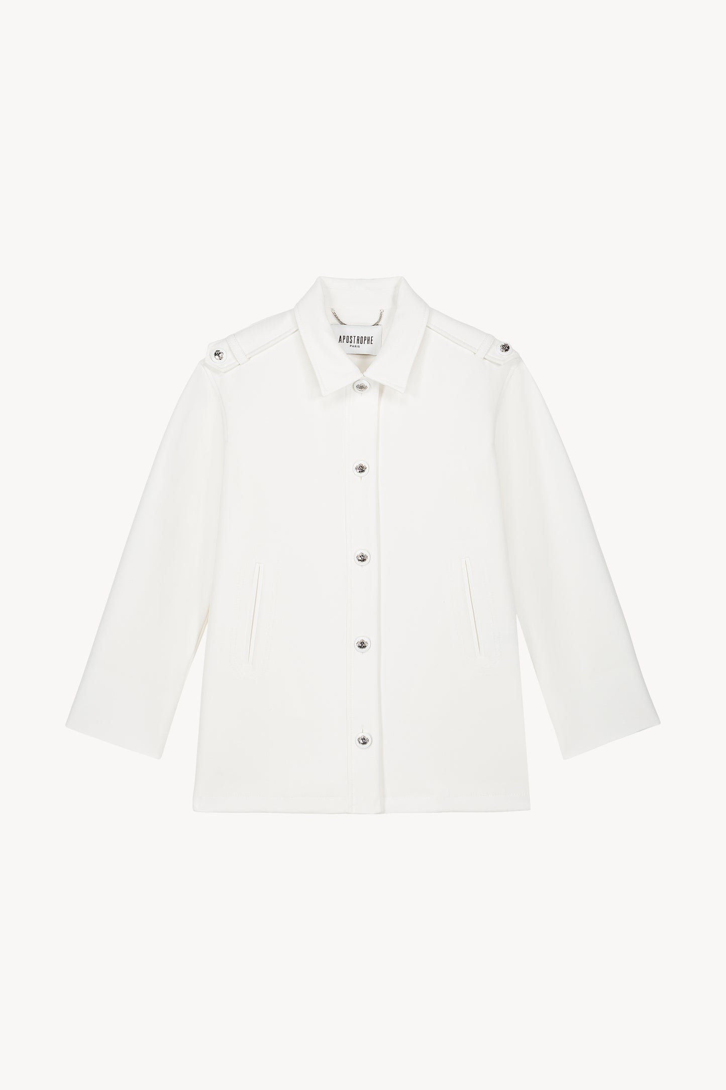Blouson blanc cassé en toile stretch avec boutons pression gravés et poches passepoilées.