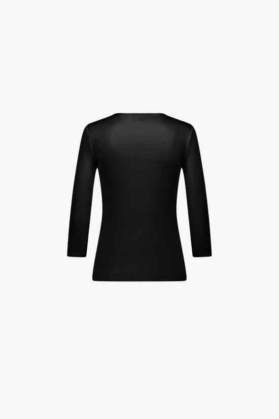 Dos du top en soie noir, tombé fluide et ligne épurée.