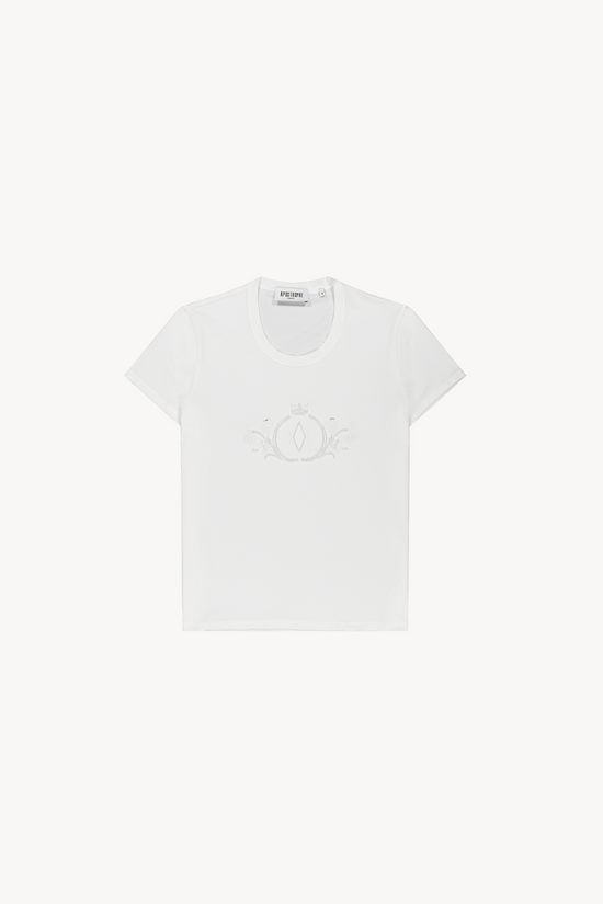 T-shirt blanc optique en jersey de coton, col rond, manches courtes, broderie délicate de perles sur le devant.