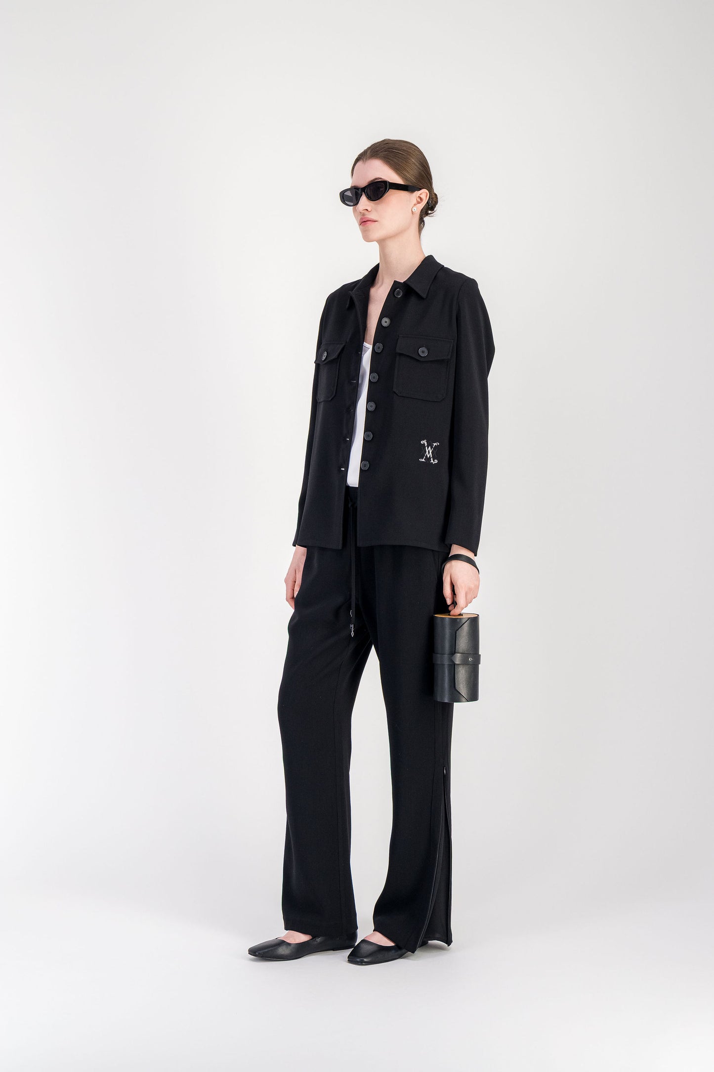 Chemise noire à col chemise & poches poitrine