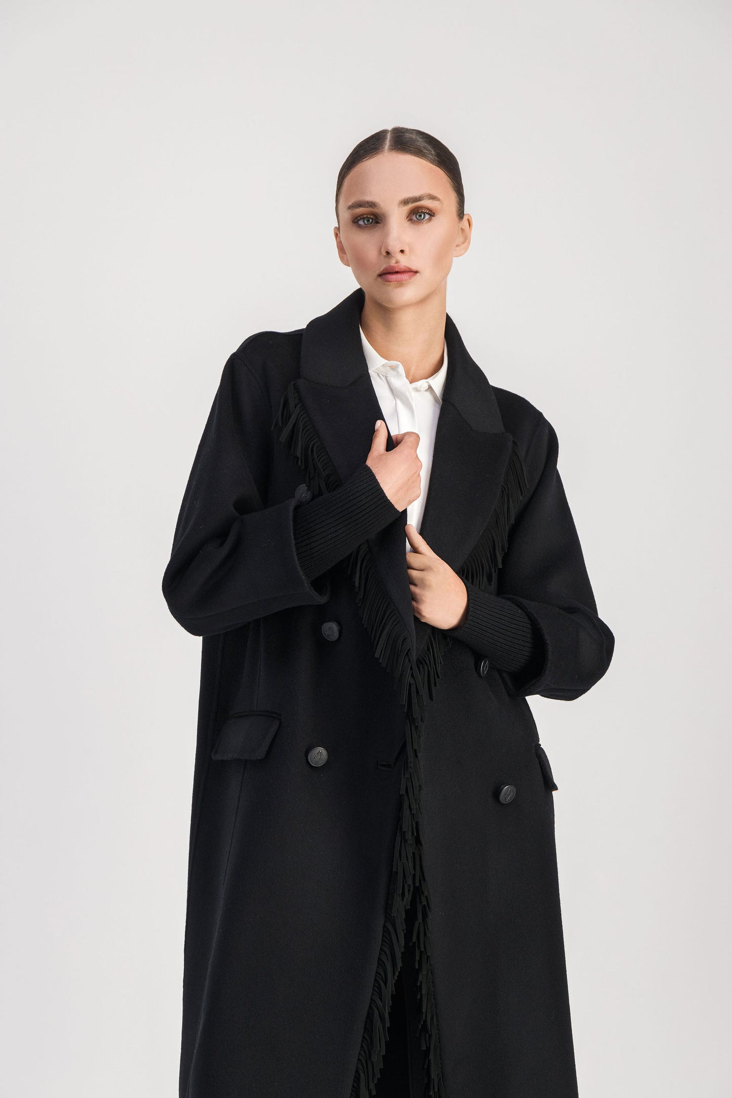 Manteau à franges noirs