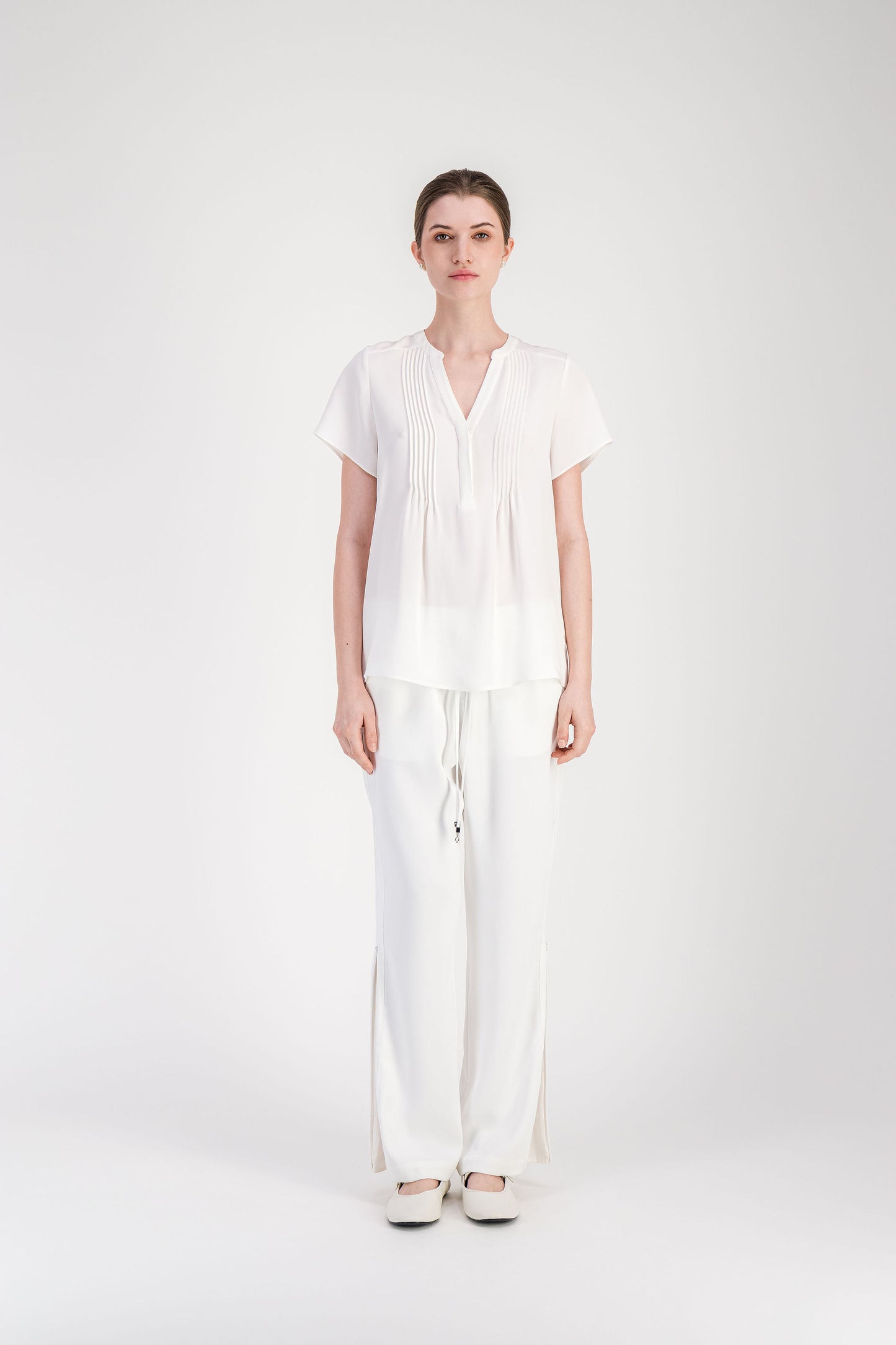 Blouse ample blanc cassé en soie à manches papillon