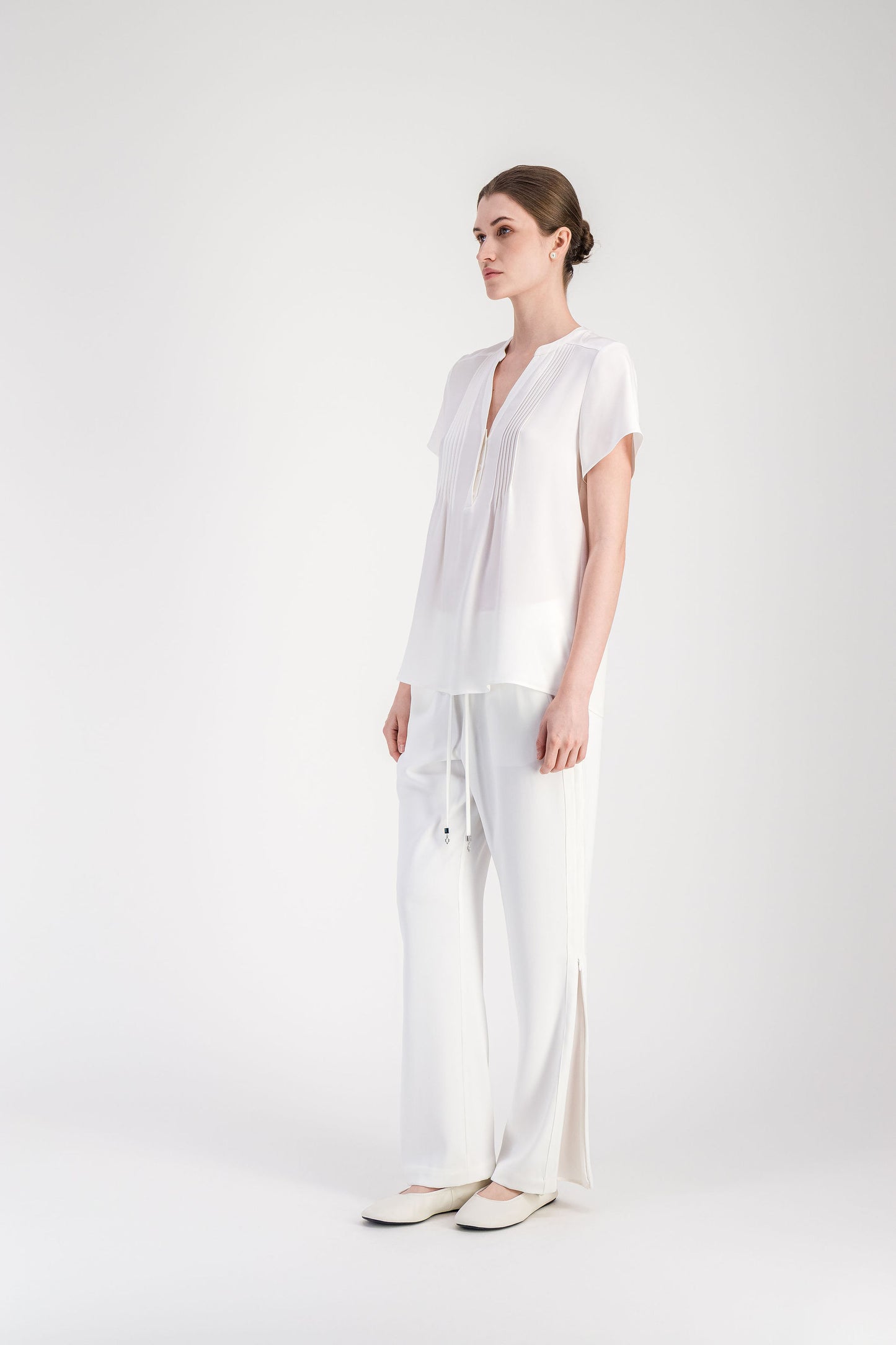 Blouse ample blanc cassé en soie à manches papillon