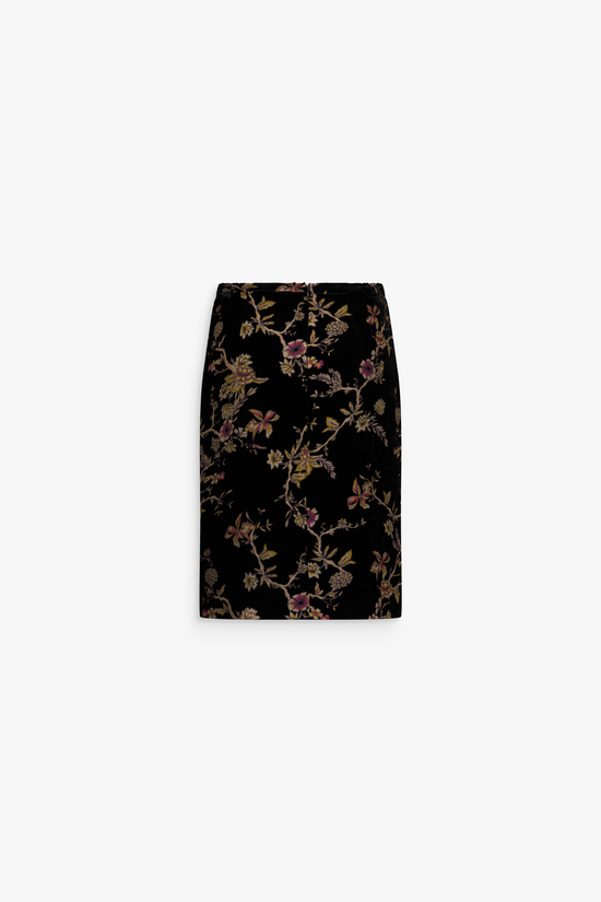 Jupe en velours de soie à taille élastiquée, ornée d’un motif floral légèrement transparent.