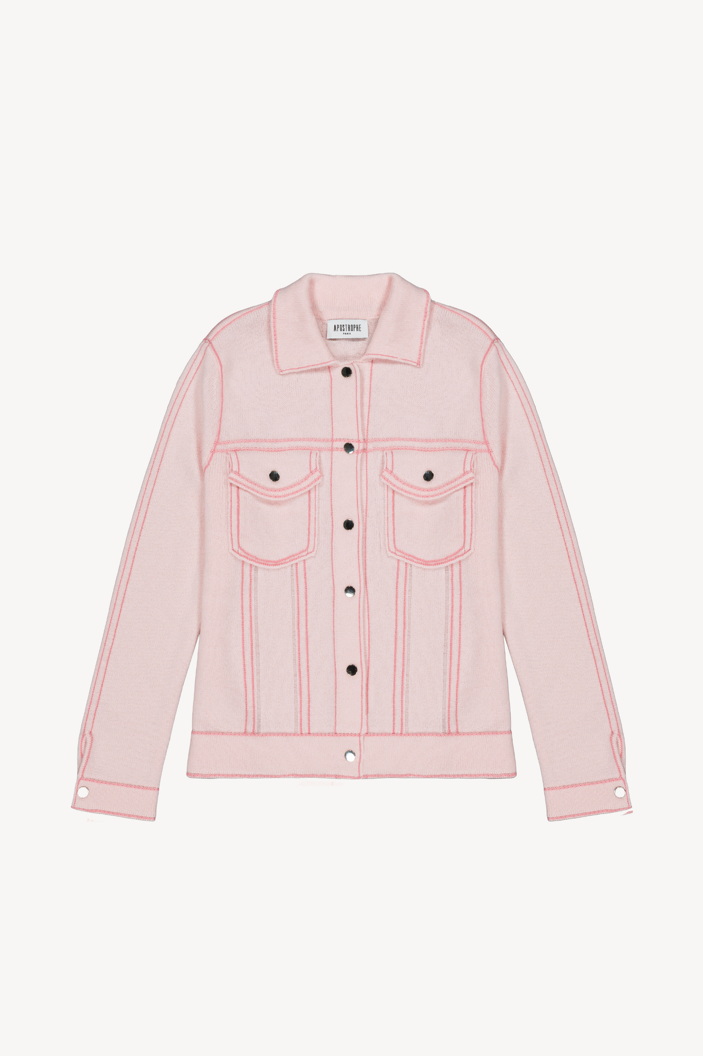 Veste en cachemire rose pâle, coupe droite et lignes nettes.