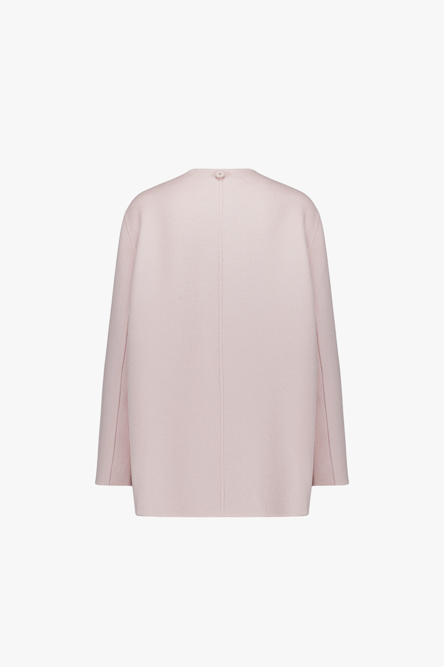 Dos du manteau rose pâle, ligne fluide et épurée.