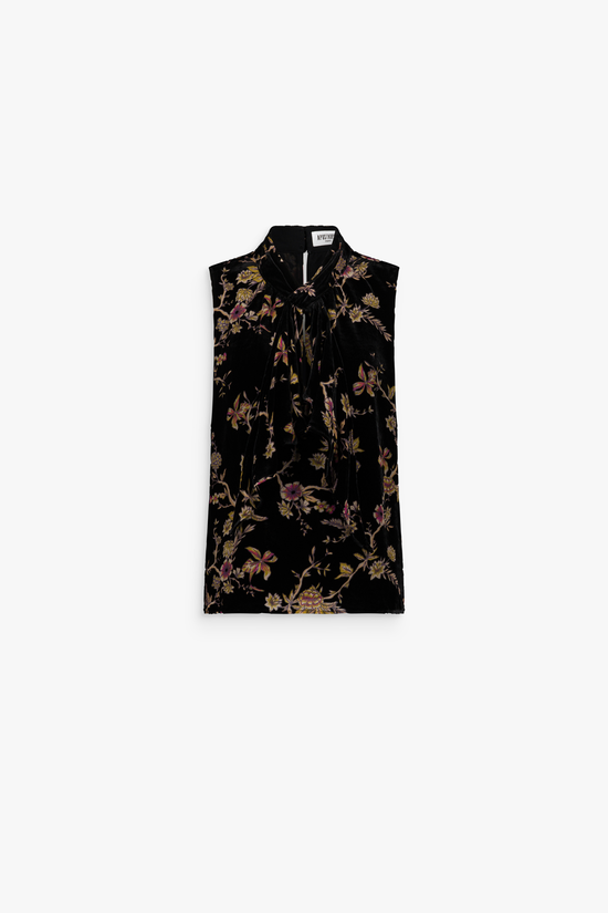 Blouse sans manches en velours de soie à motif floral avec col lavallière.