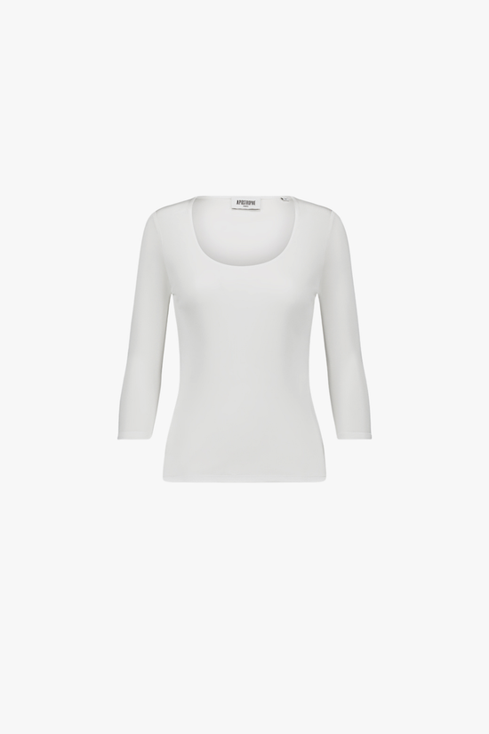 Dos du top en blanc cassé noir, tombé fluide et ligne épurée.