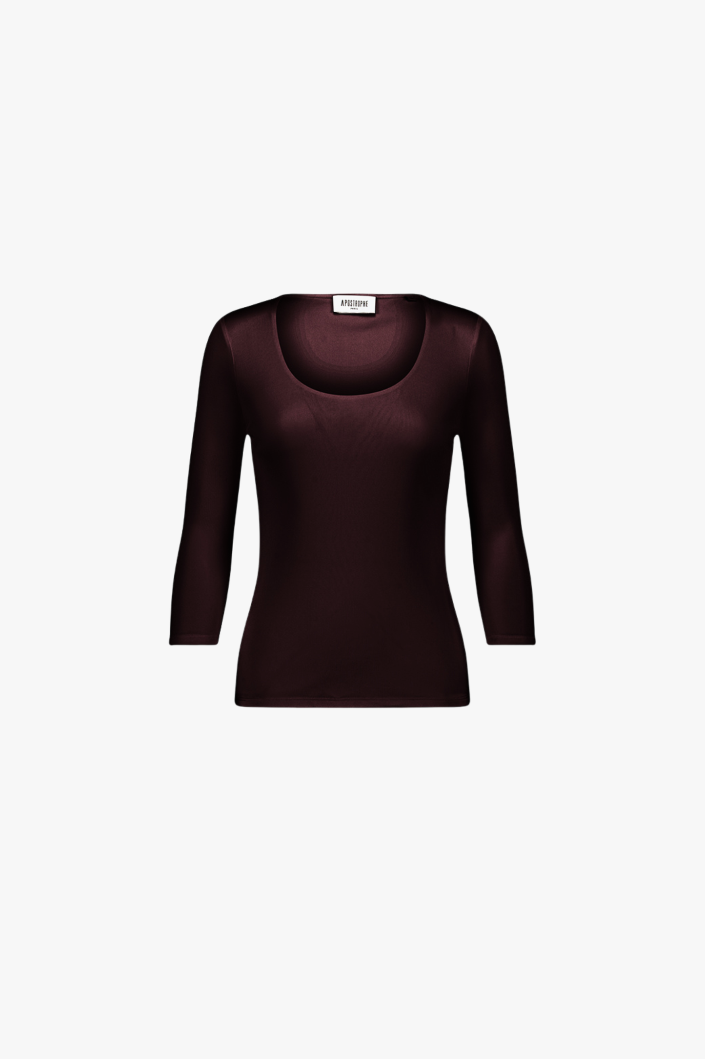 Dos du top en soie grenat, tombé fluide et ligne épurée.