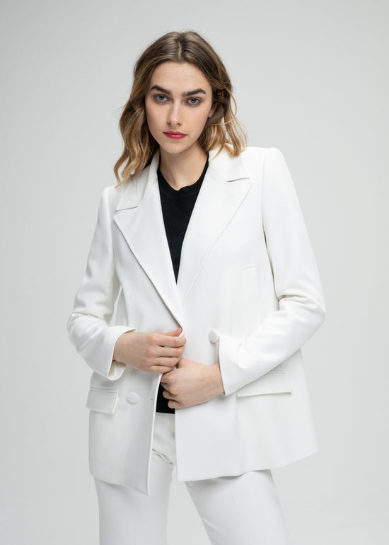 Manteau caban croisé coupe blazer blanc quatre boutons et poches passepoilés latérales