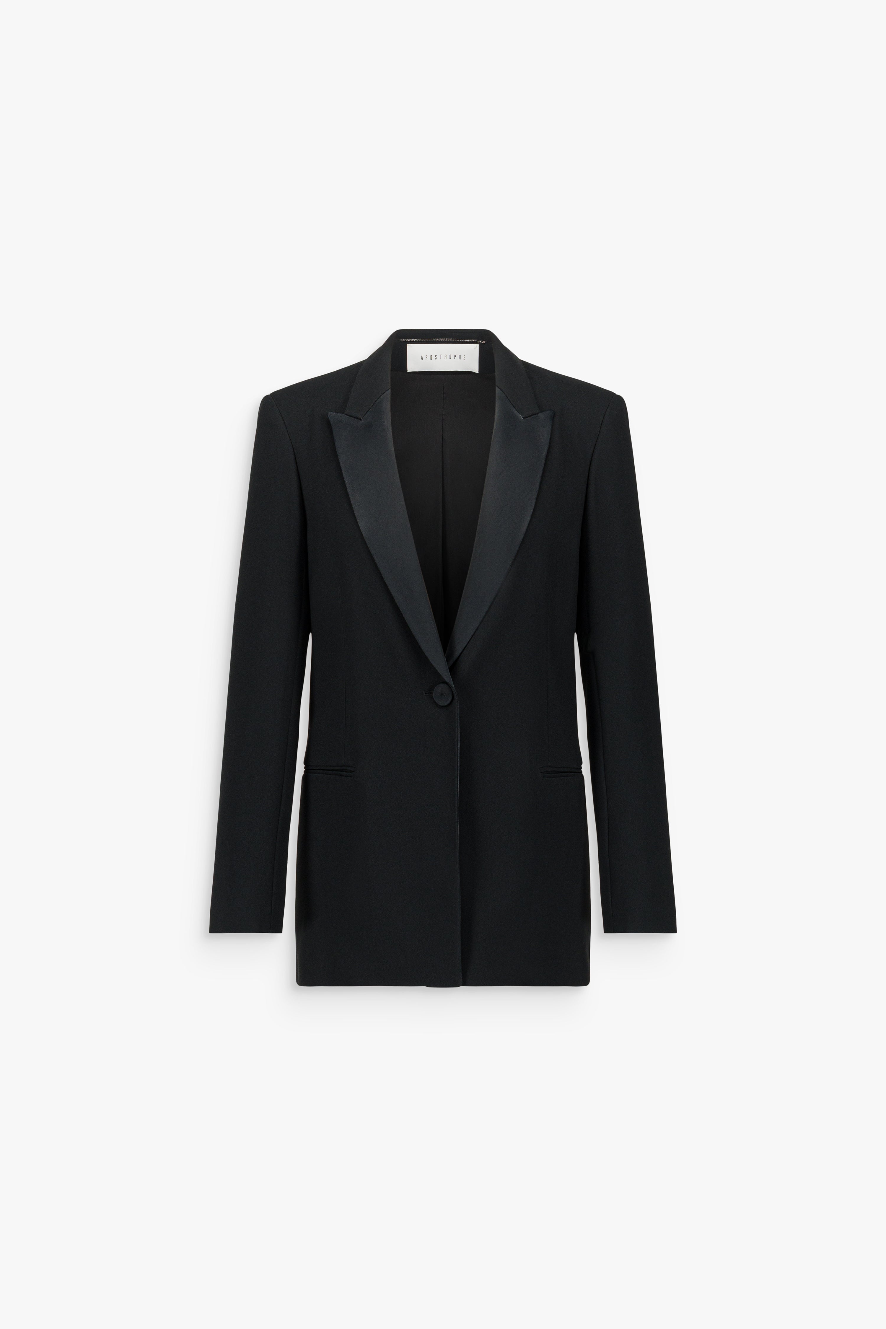 Veste tailleur noire à col châle et fermeture simple boutonnage.