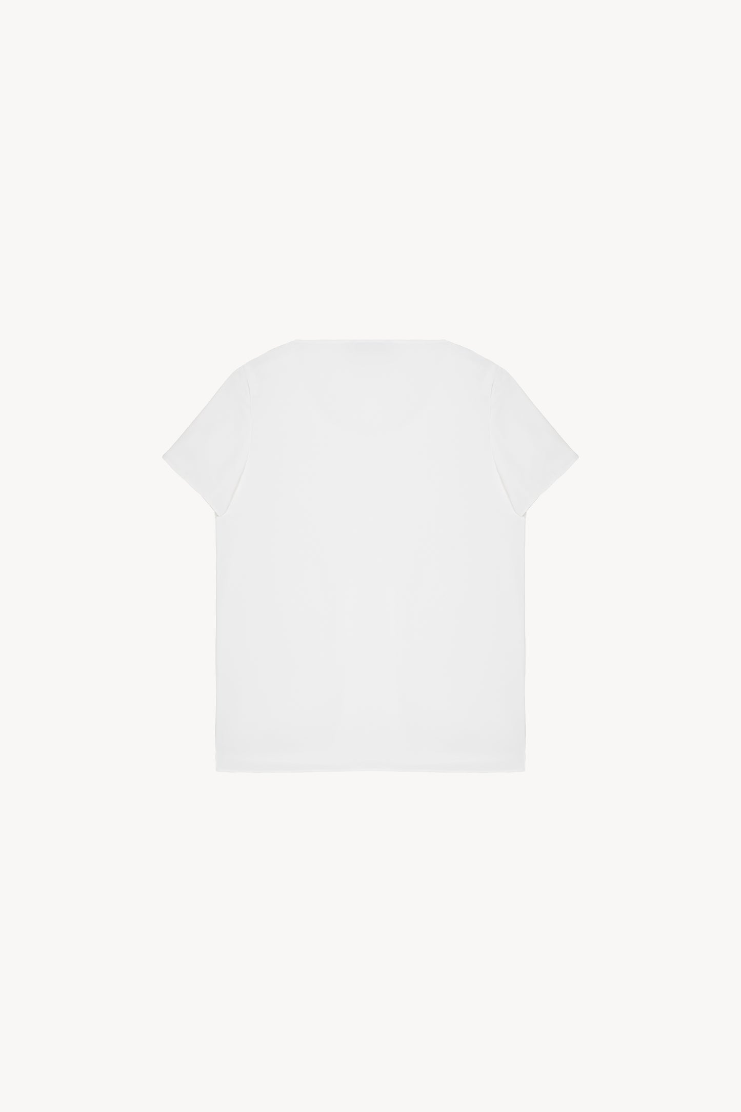  Ce top blanc à manches courtes .