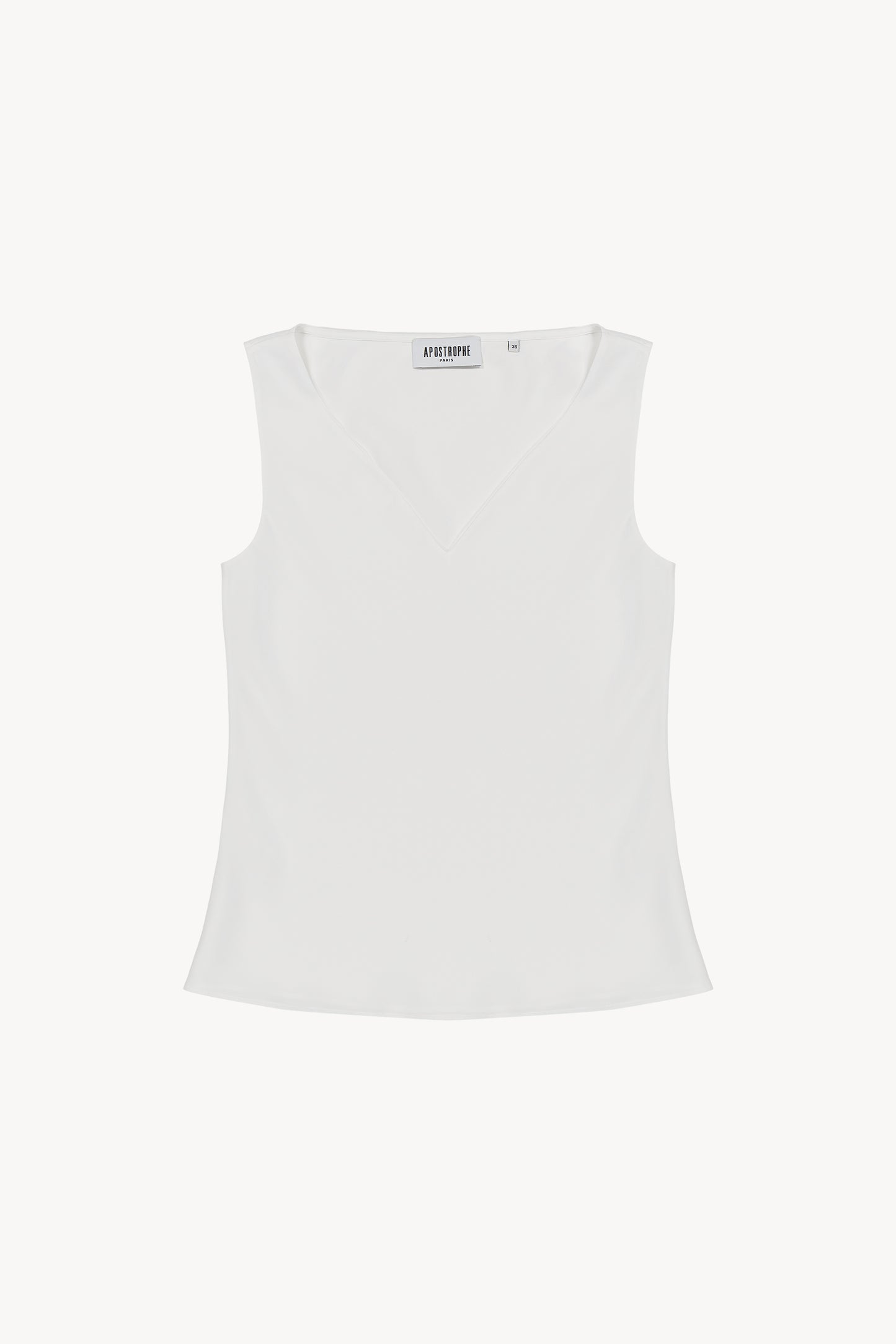 Débardeur sans manches à col V. Coupe ajustée . Zip invisible sur le côté.