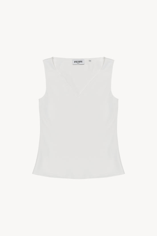 Débardeur sans manches à col V. Coupe ajustée . Zip invisible sur le côté.