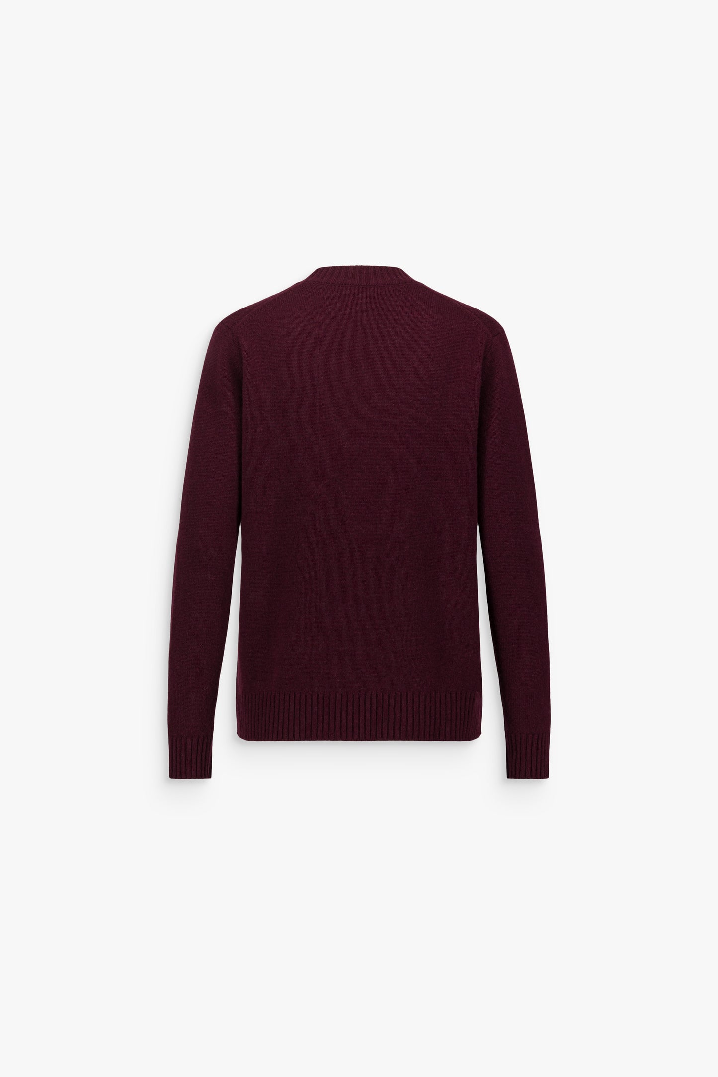 Pull long rouge en cachemire, à col rond, manches longues et finitions côtelées.