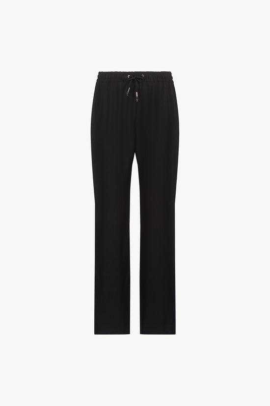 Pantalon fluide large noir avec ceinture froncée et cordons réglables avec embouts métal gravés