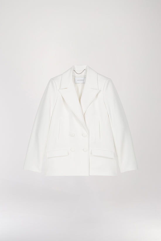 Manteau caban blanc à coupe droite pour une allure subtilement surdimensionnée. Doté d’un double boutonnage croisé, de poches passepoilées et de poches à rabat fonctionnelles. Le logo sur chaque élément ajoute une touche personnalisée et raffinée à ce modèle élégant.