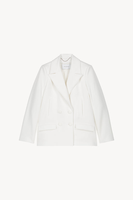 Manteau caban blanc doté d’un double boutonnage croisé, de poches passepoilées et de poches à rabat fonctionnelles. 