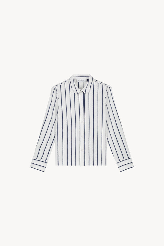 Chemise courte rayées marine taillée dans une coupe courte et droite.
