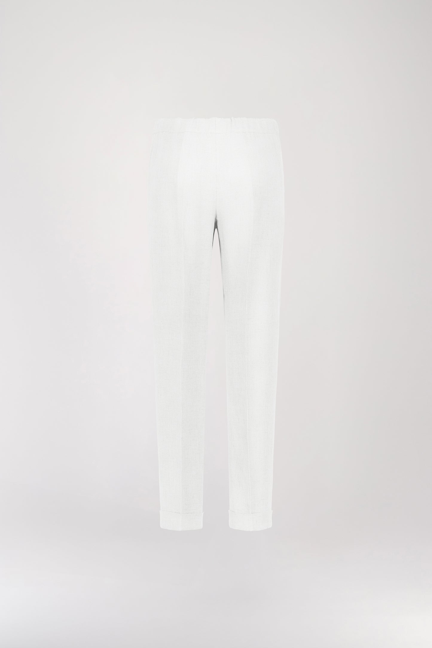 Pantalon à plis en lin blanc décontracté rehaussé d'une taille froncée maintenant la taille.Orné d'un plis marqués, une taille élastique froncée et de poches italiennes.