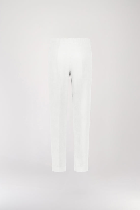 Pantalon à plis en lin blanc décontracté rehaussé d'une taille froncée maintenant la taille.Orné d'un plis marqués, une taille élastique froncée et de poches italiennes.