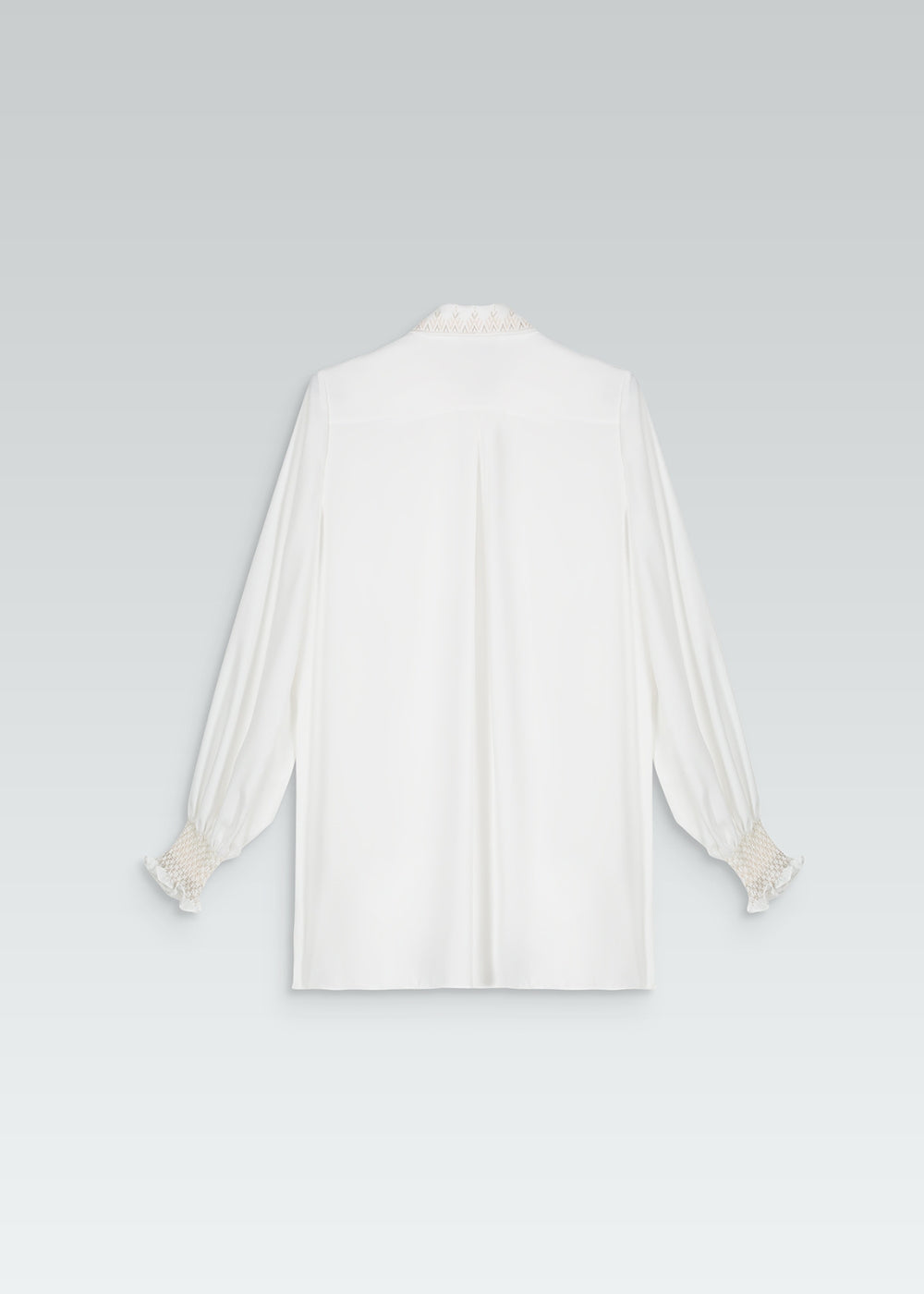 Chemise manches bouffantes froncées blanc avec détails col et manches brodés