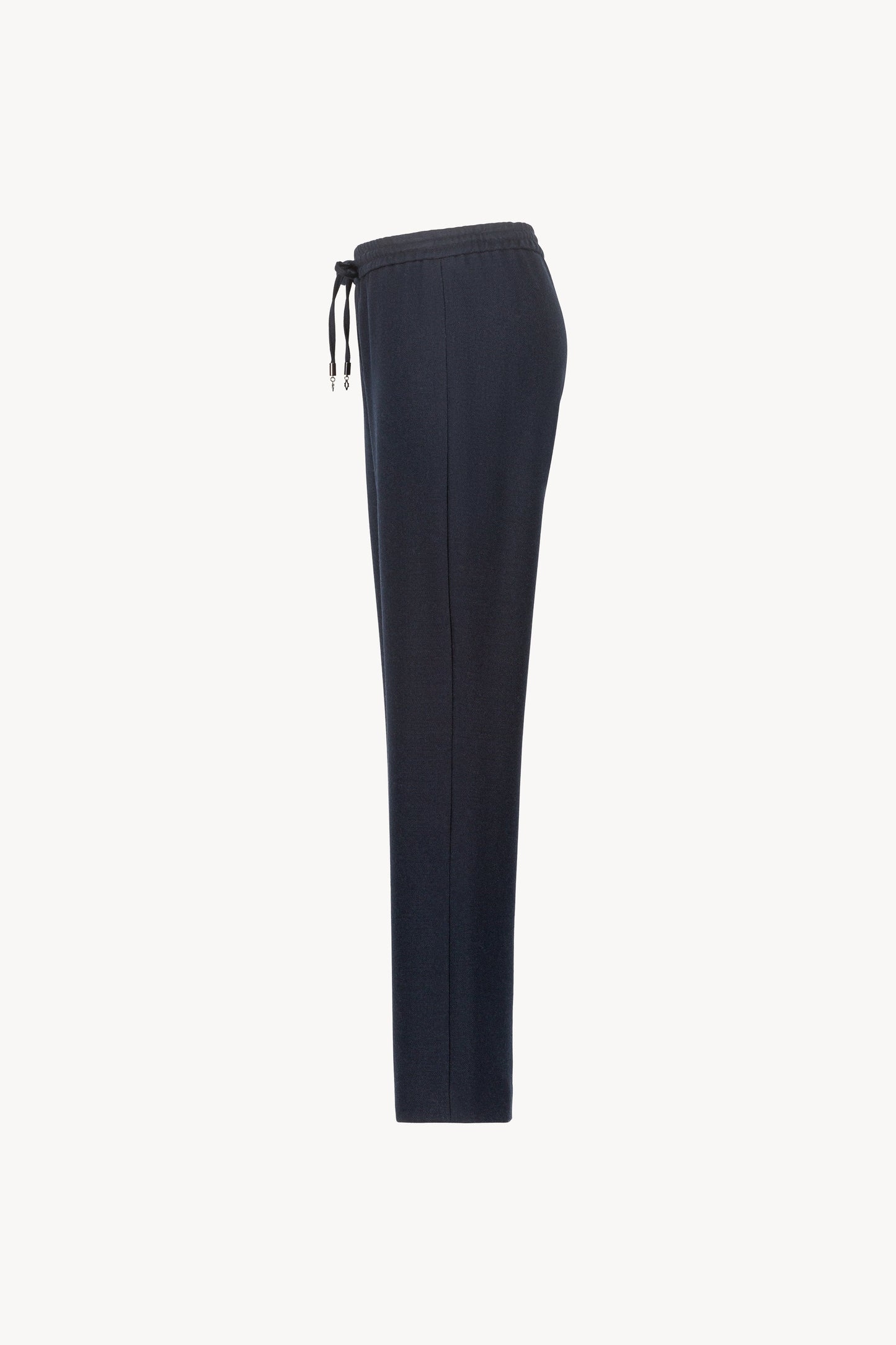 Pantalon marine orné d'une coupe décontractée, avec des jambes fluides et une taille élastique dotée d'un cordon de serrage sur le devant.