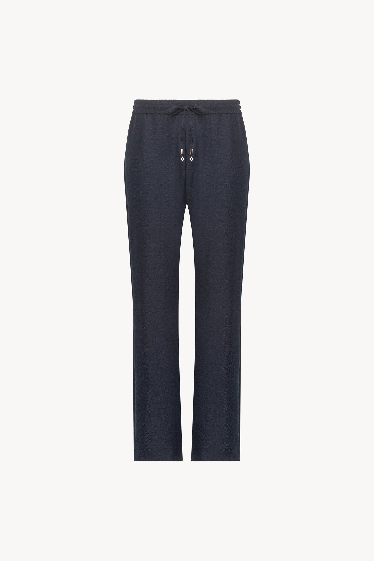 Pantalon marine orné d'une coupe décontractée, avec des jambes fluides et une taille élastique dotée d'un cordon de serrage sur le devant.