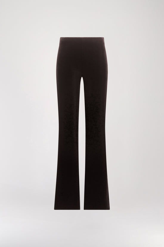 Pantalon en velours ebene orné d'une coupe ample, zip latérale invisible et des jambes évasées.