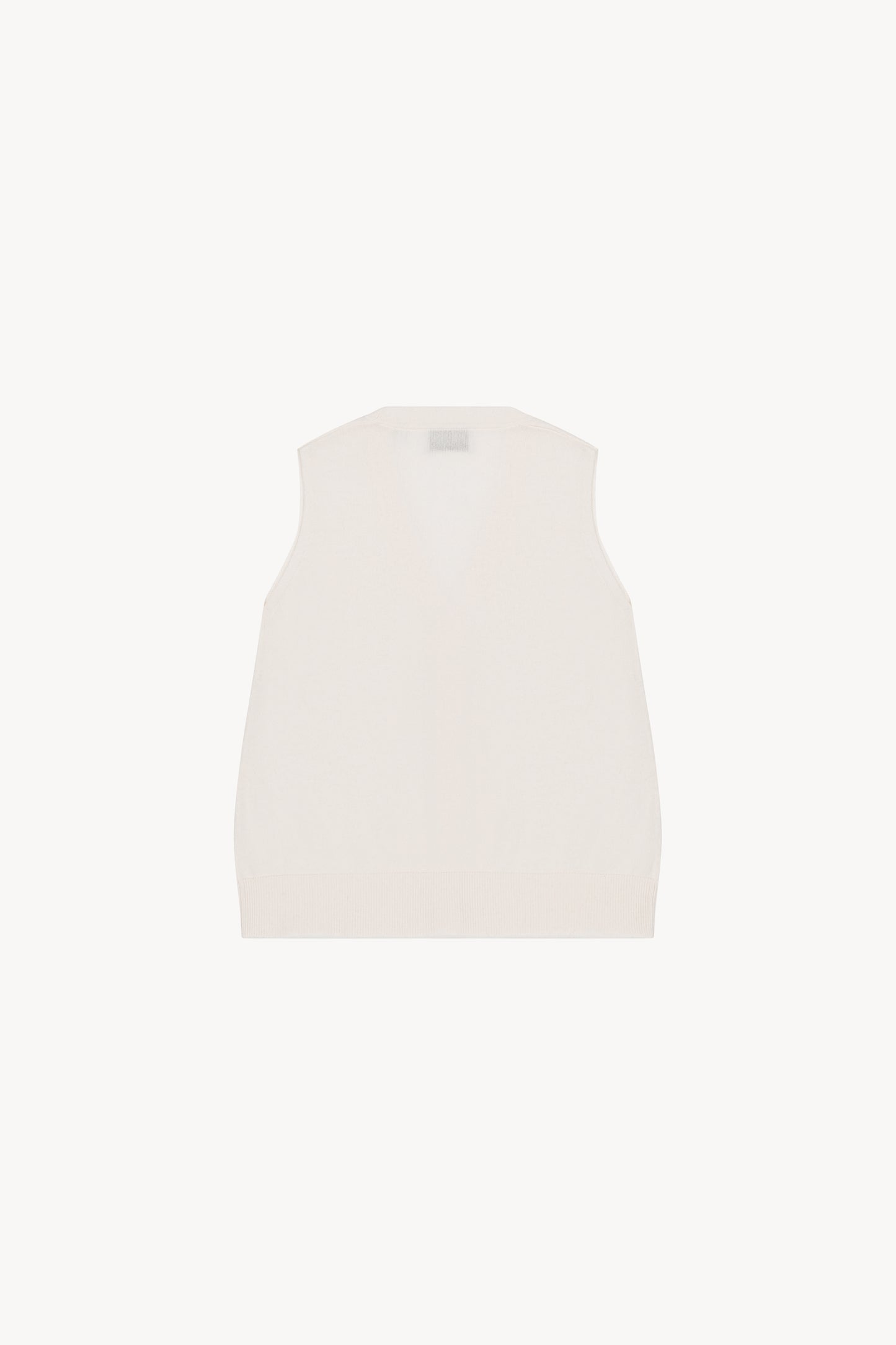 Gilet blanc casse sans manches, épuré, avec col V .