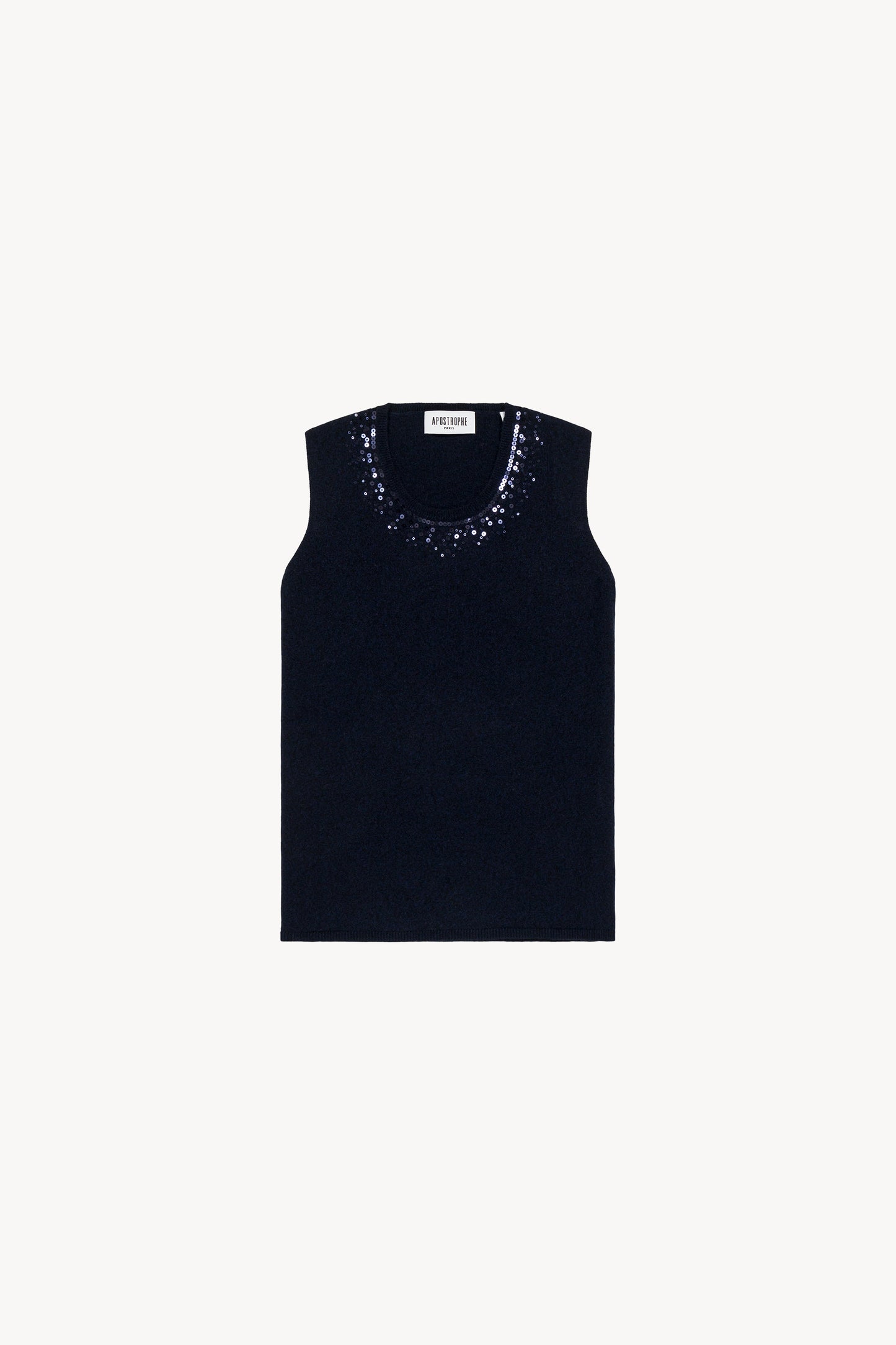 Pull sans manches marine incarne la sophistication à l'état pur. Confectionné en laine fine de qualité, il se distingue par son col rond délicatement orné de paillettes et ses finitions côtelées,
