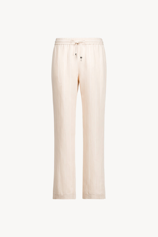 Ce pantalon droit en lin beige à rayures fines allie confort et sophistication grâce a sa coupe fluide et légère