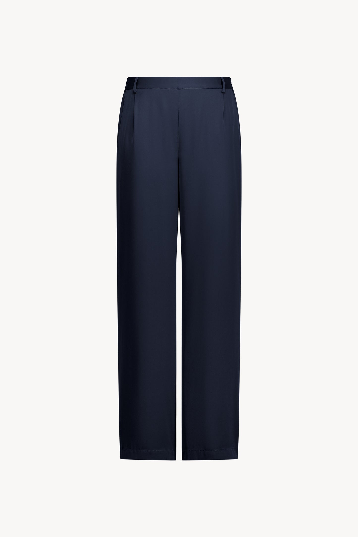 Polyvalent et élégant, ce pantalon droit marine doté d'une ceinture élastique intérieure  et de poches plaquées pour une touche pratique