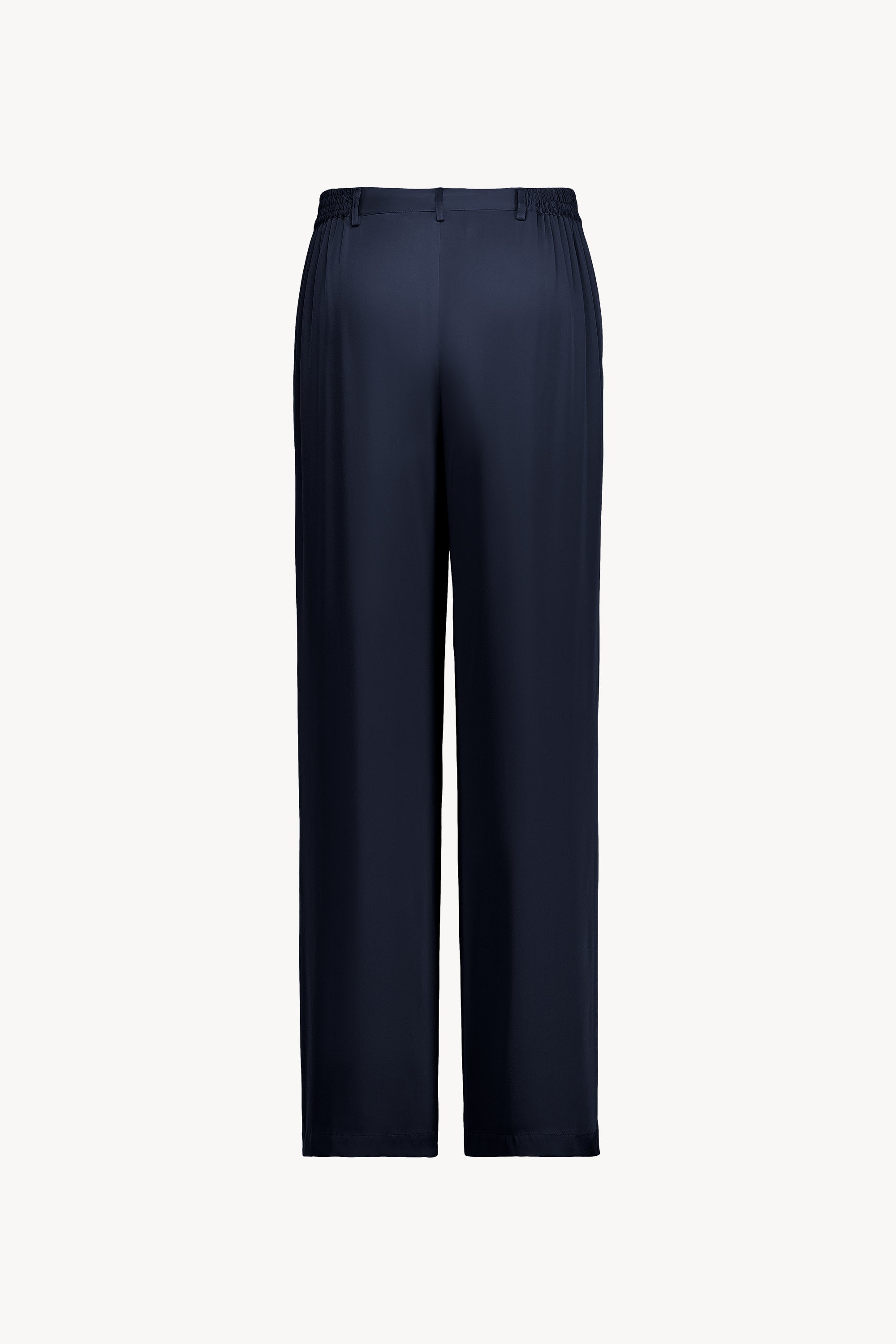 Polyvalent et élégant, ce pantalon droit marine doté d'une ceinture élastique intérieure  et de poches plaquées pour une touche pratique
